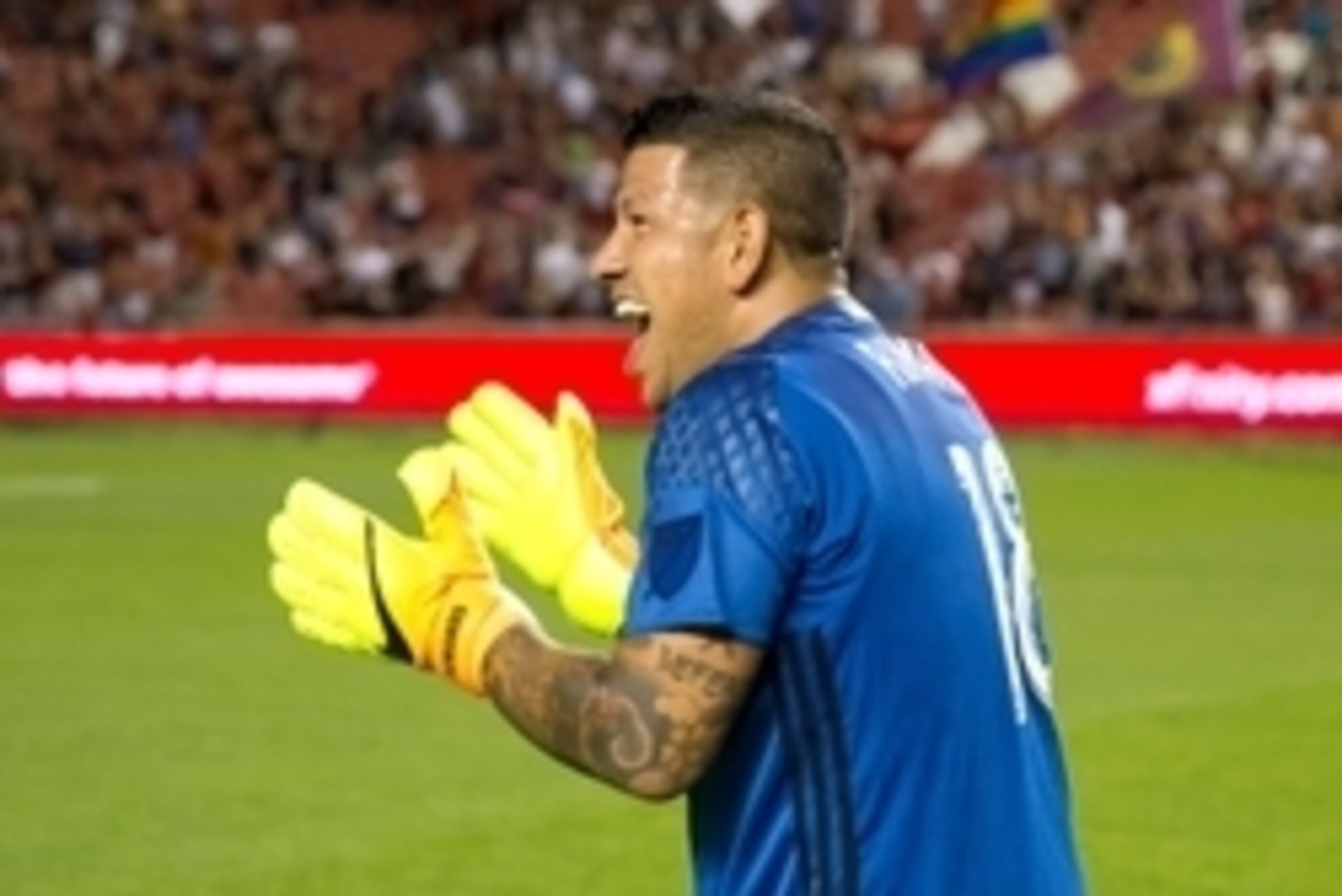 Aug 6, 2016; Sandy, UT, USA; Real Salt Lake goalkeeper Nick Rimando (18) celebrates after defeating the Chicago Fire 3-1 at Rio Tinto Stadium. Rimando became the career leader in all-time wins for an MLS goalkeeper. Mandatory Credit: Russ Isabella-USA TOD
