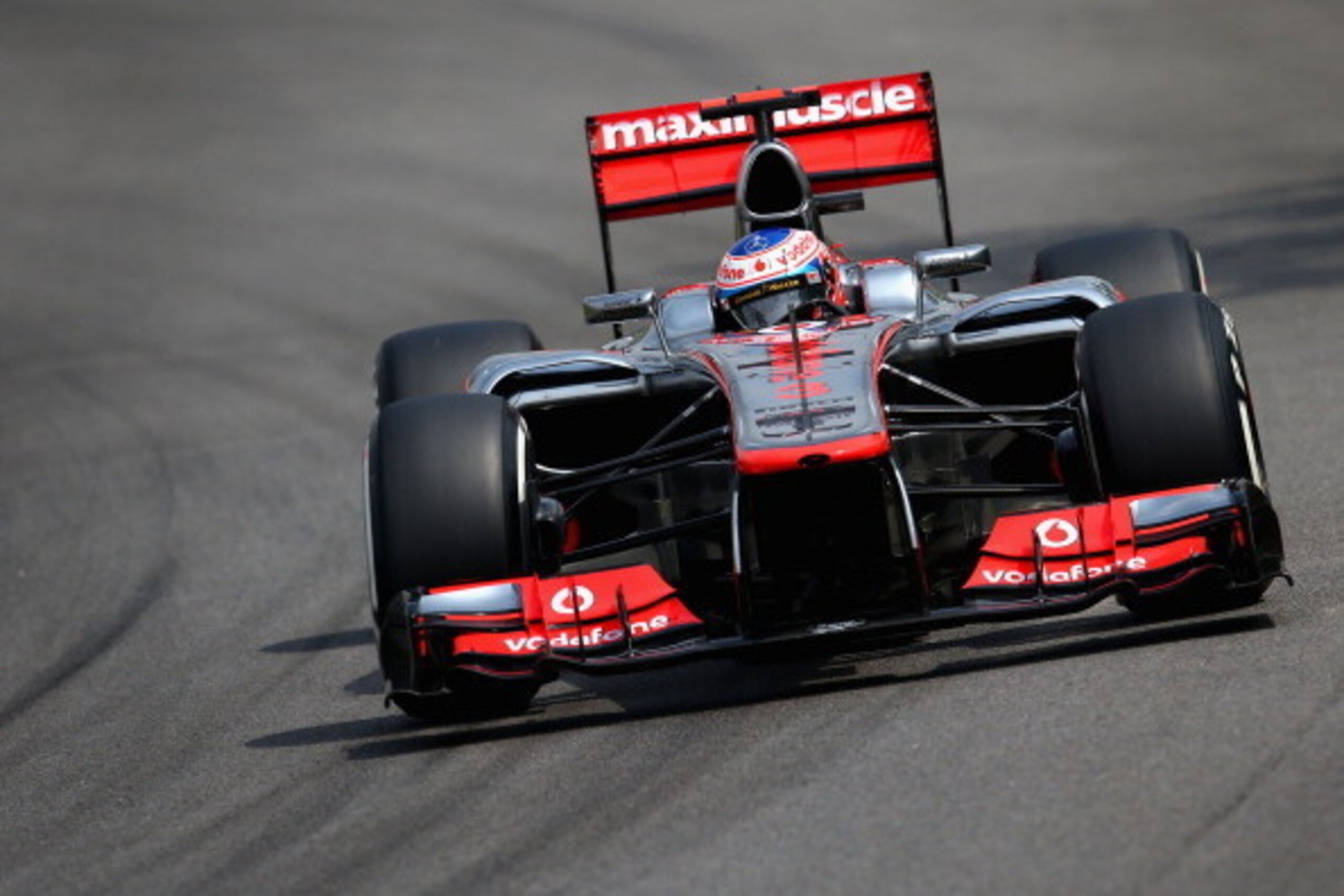 SAO PAULO, BRAZIL - NOVEMBER 24:  Jenson Button of Great Britain and McLaren drives during qualifying for the Brazilian Formula One Grand Prix at the Autodromo Jose Carlos Pace on November 24, 2012 in Sao Paulo, Brazil.  (Photo by Clive Mason/Getty Images