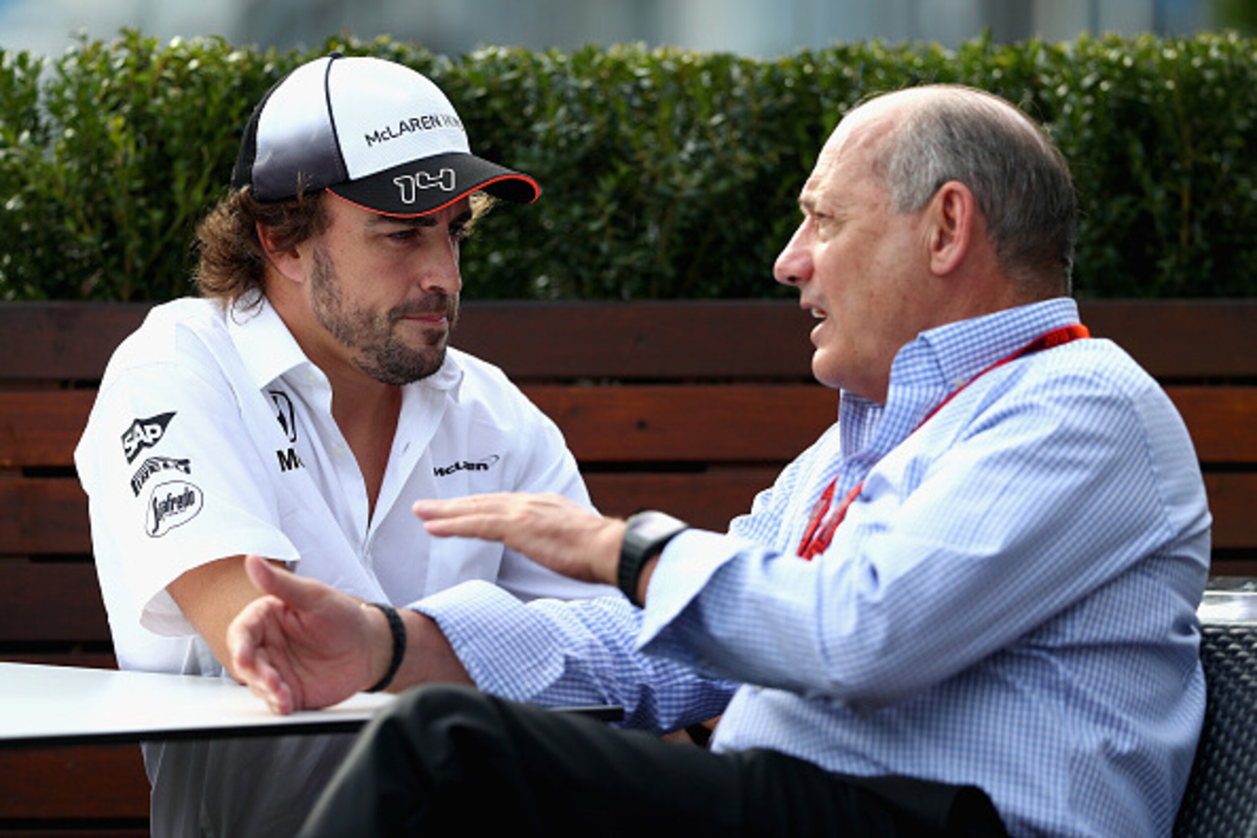 MELBOURNE, AUSTRALIA - MARCH 17:  Fernando Alonso of Spain and McLaren Honda talks with Chairman and Chief Executive Officer of McLaren Group Ron Dennis in the Paddock during previews to the Australian Formula One Grand Prix at Albert Park on March 17, 20