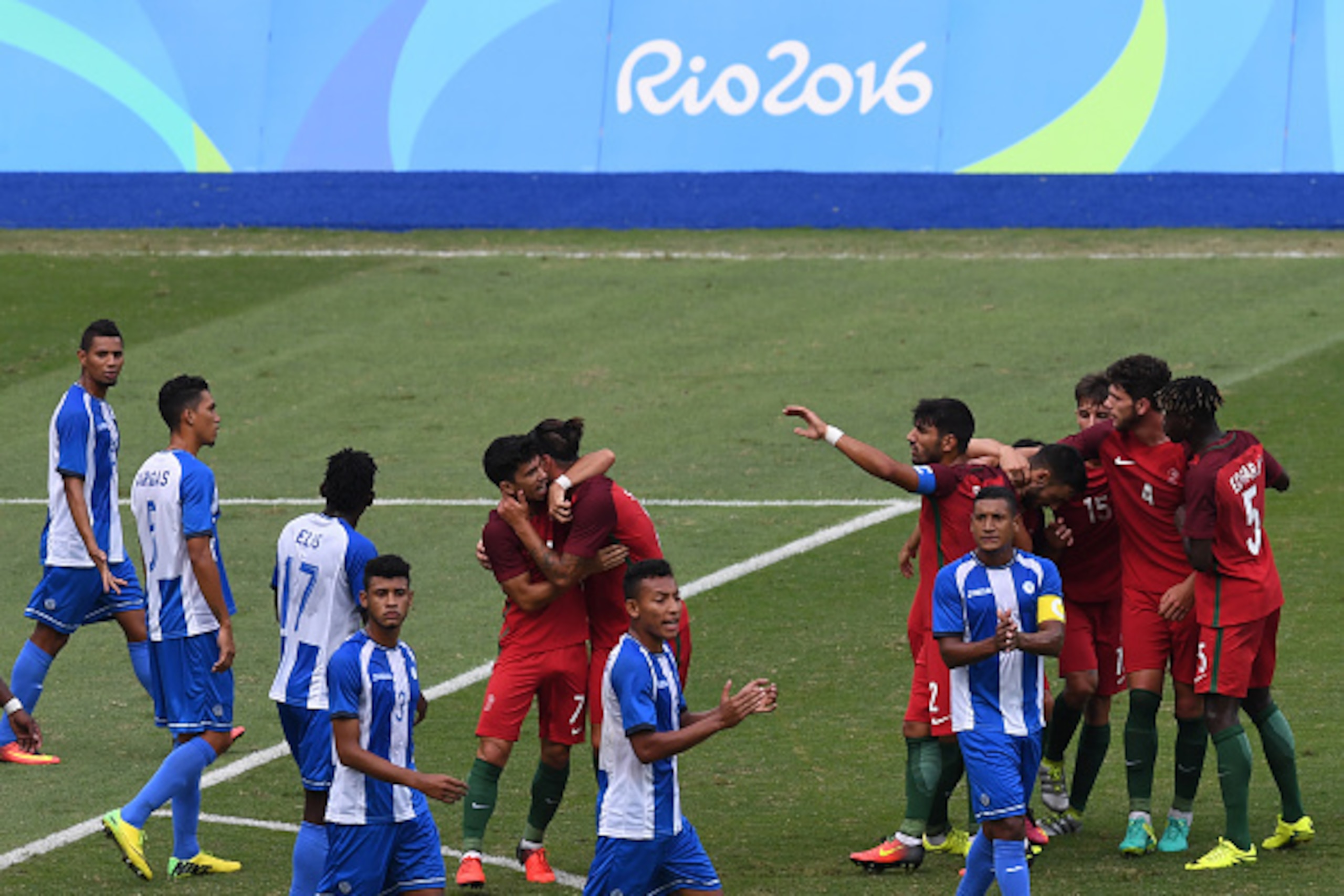 Tobias Figueiredo (2nd R) of Portugal celebrates with teammates after scoring against Honduras during their Rio 2016 Olympic Games men's First Round Group D football match at the Olympic Stadium in Rio de Janeiro, Brazil, on August 7, 2016. / AFP / VANDER Tobias Figueiredo (2nd R) of Portugal celebrates with teammates after scoring against Honduras during their Rio 2016 Olympic Games men's First Round Group D football match at the Olympic Stadium in Rio de Janeiro, Brazil, on August 7, 2016. / AFP / VANDER