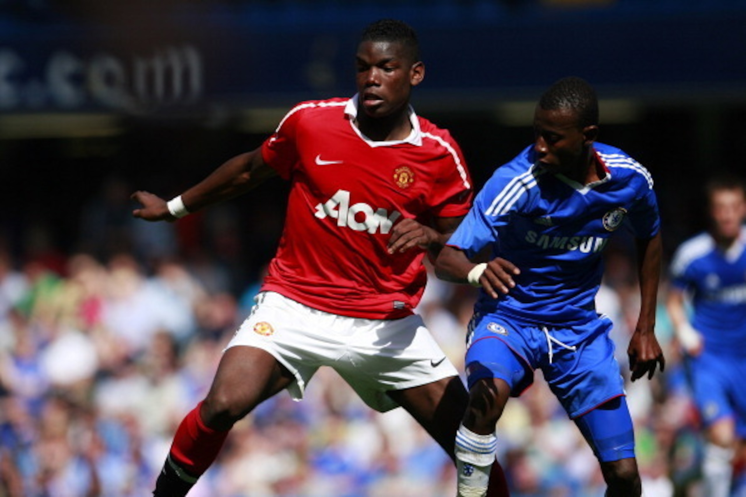 LONDON, ENGLAND - APRIL 10:  Adam Nditi (R) of Chelsea in action against Paul Pogba of Manchester United during the FA Youth Cup sponsored by E.on semi final first leg match between Chelsea and Manchester United at Stamford Bridge on April 10, 2011 in Lon