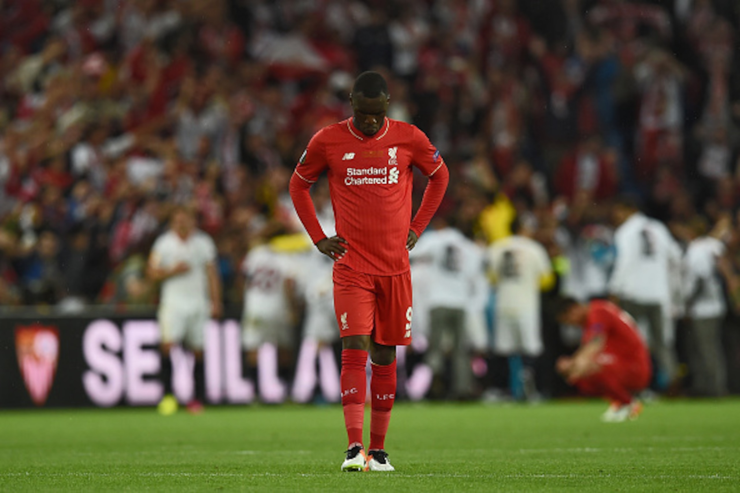 Liverpool's Belgian forward Christian Benteke reacts  after losing  the UEFA Europa League final football match between Liverpool FC and Sevilla FC at the St Jakob-Park stadium in Basel, on May 18, 2016.   AFP PHOTO / PAUL ELLIS / AFP / PAUL ELLIS        