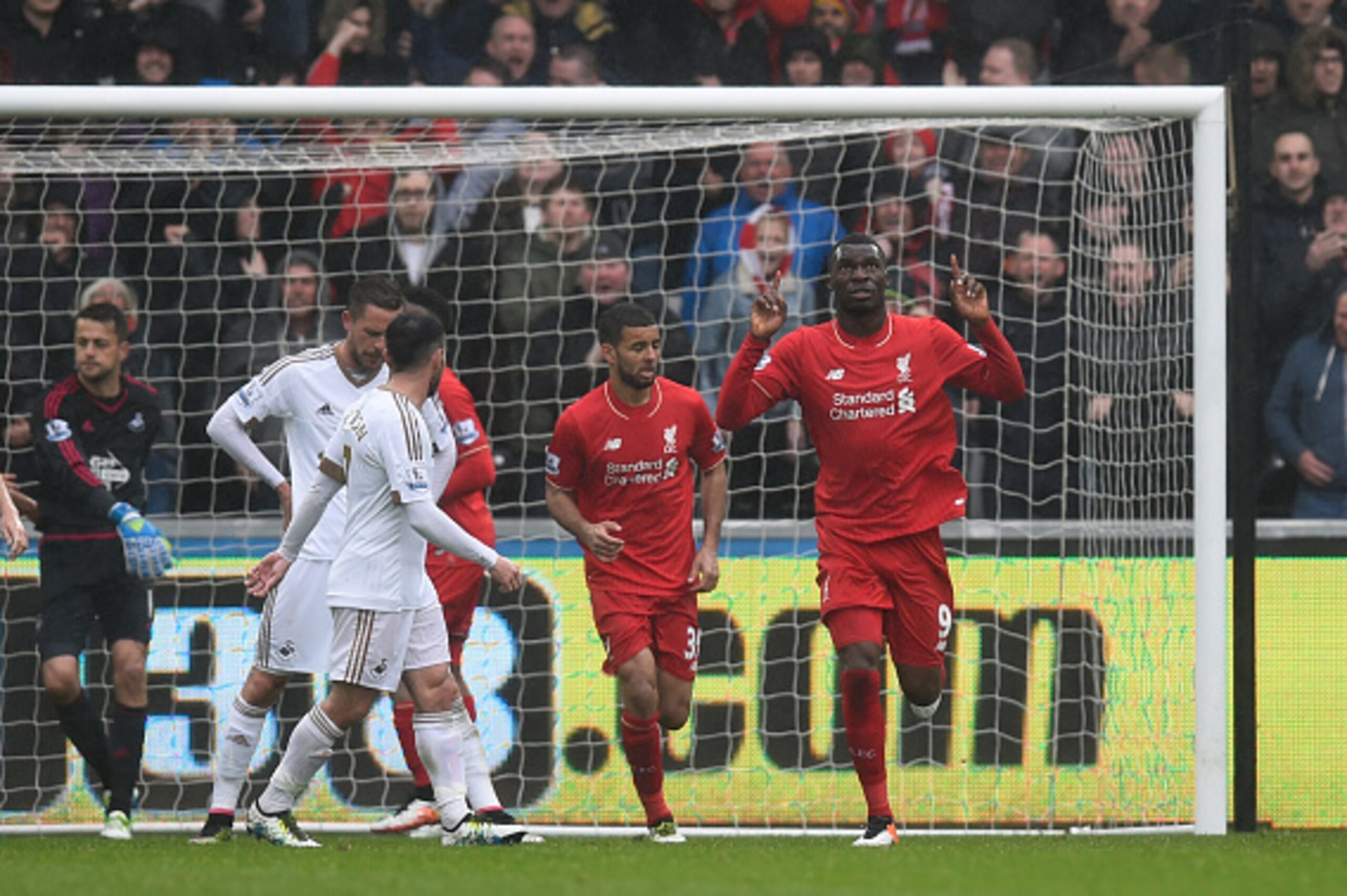 SWANSEA, WALES - MAY 01:  Christian Benteke of Liverpool celebrates scoring his team's opening goal during the Barclays Premier League match between Swansea City and Liverpool at The Liberty Stadium on May 1, 2016 in Swansea, Wales.  (Photo by Stu Forster