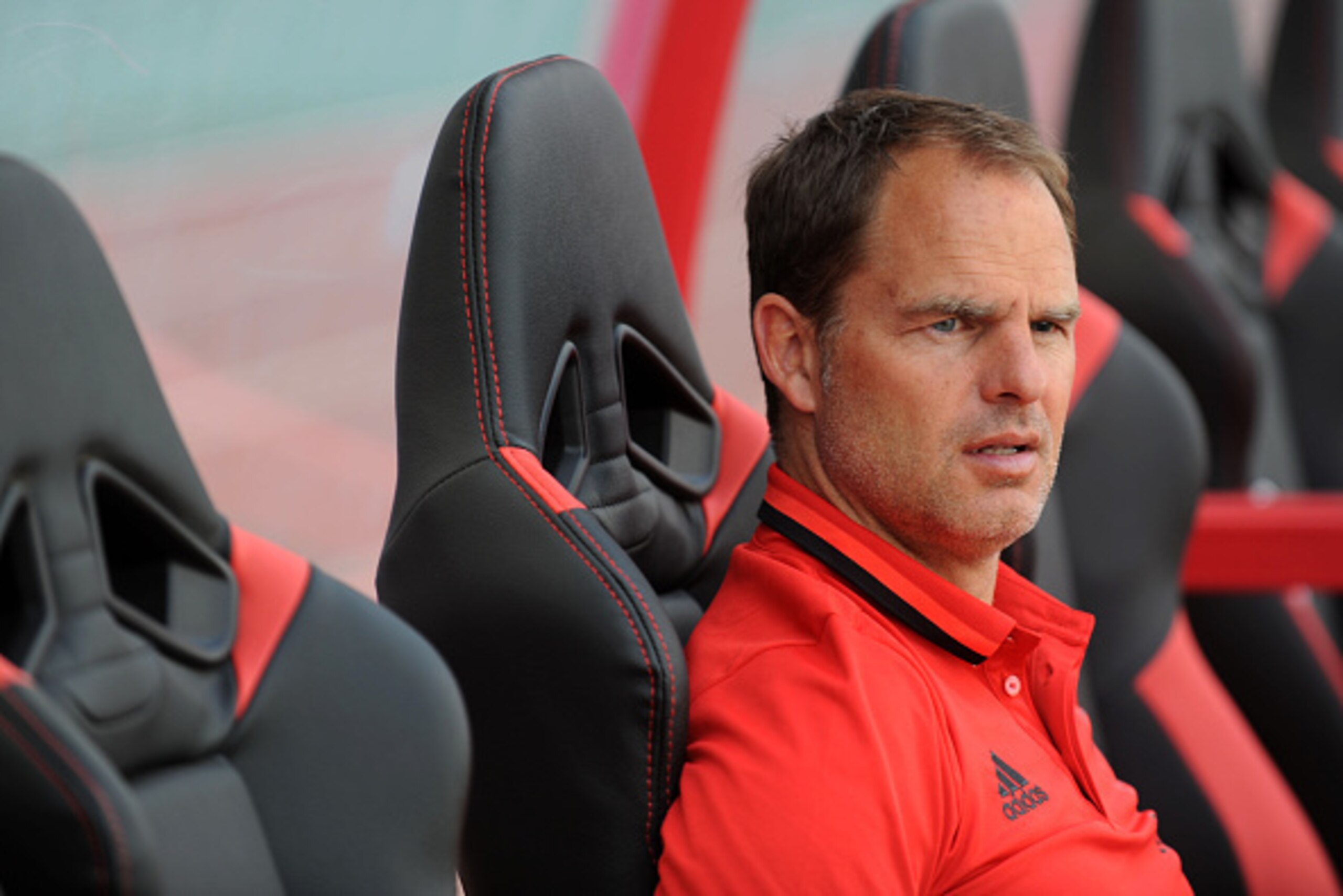 Ajax Amsterdam football club's coach Frank de Boer sits at the team bench during a training session in Shenyang, northeast China's Liaoning province on May 17, 2016. 
Ajax will play a friendly match against Chinese Super League club Liaoning Whowin FC on 