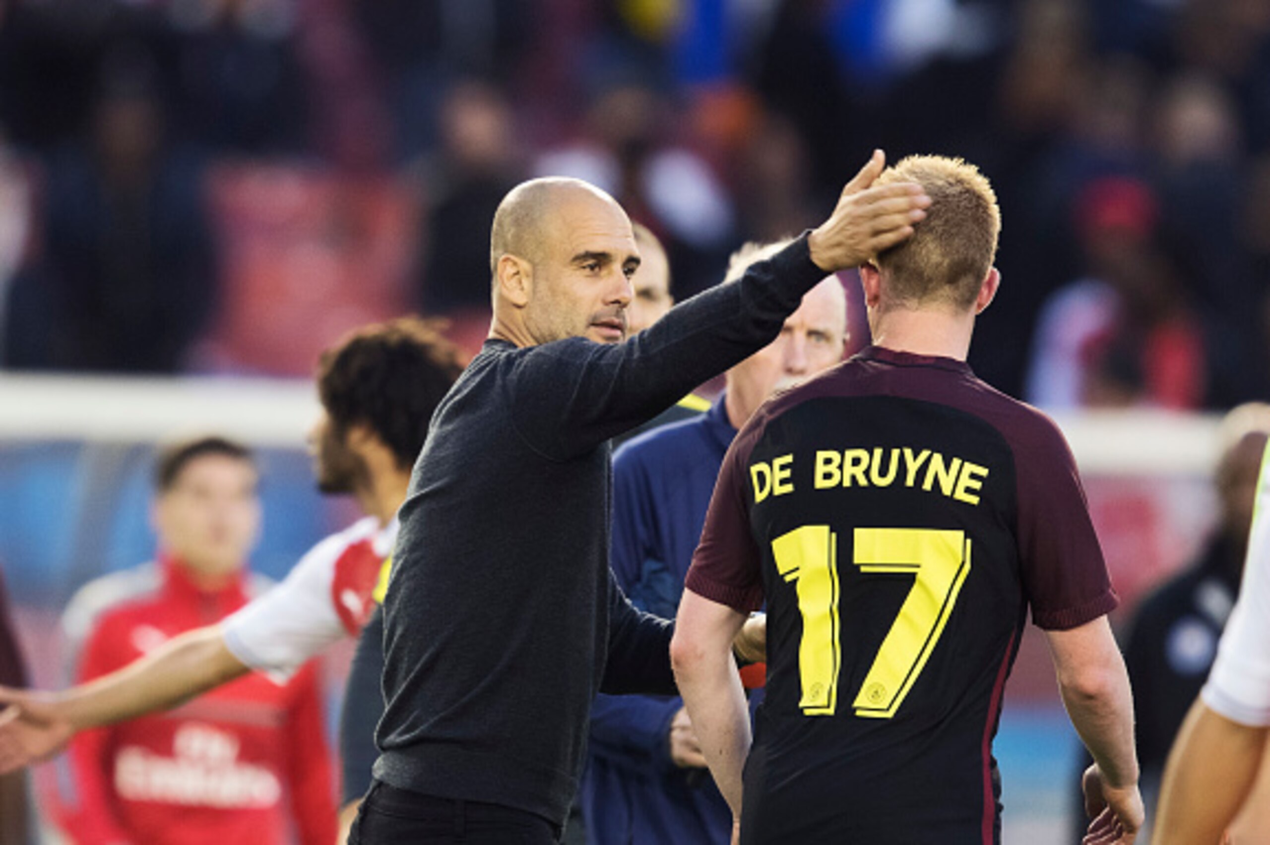 GOTHENBURG, SWEDEN - AUGUST 07: Pep Guardiola, head coach of Manchester City and Kevin de Bruyne of Manchester City during the Pre-Season Friendly between Arsenal and Manchester City at Ullevi on August 7, 2016 in Gothenburg, Sweden. (Photo by Nils Petter