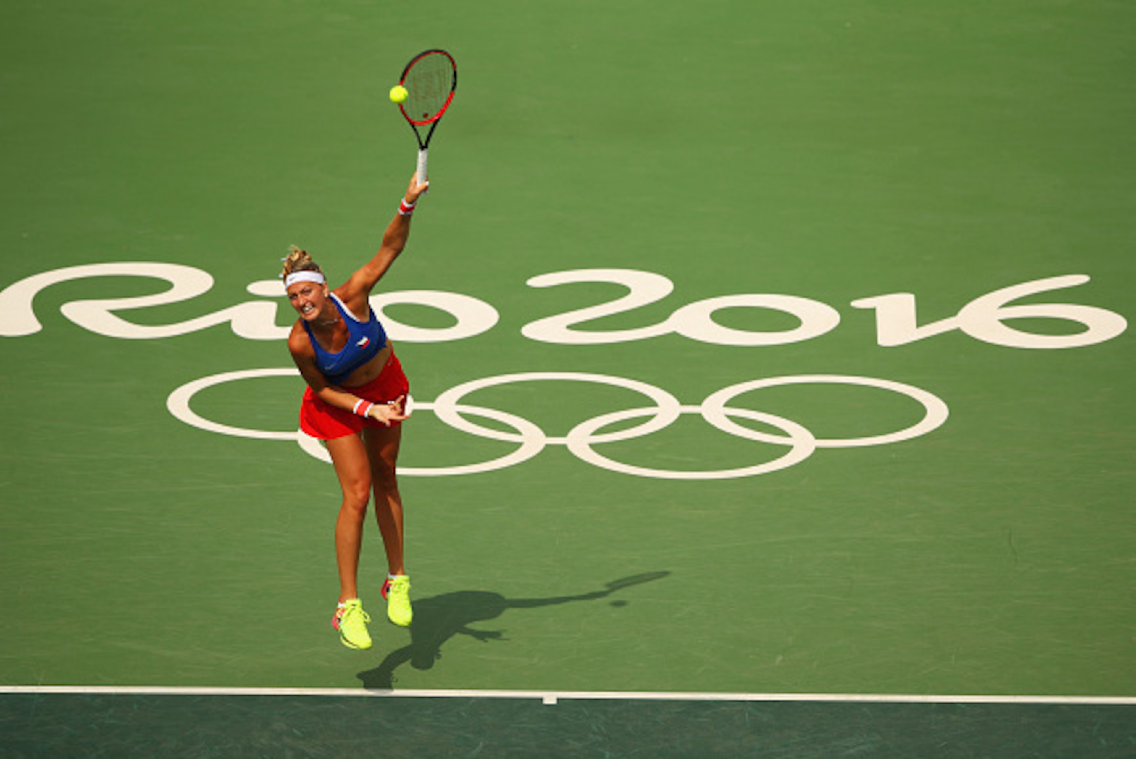 RIO DE JANEIRO, BRAZIL - AUGUST 08:  Petra Kvitova of the Czech Republic serves during the Women's Singles second round match against Caroline Wozniacki of Denmark on Day 3 of the Rio 2016 Olympic Games at the Olympic Tennis Centre on August 8, 2016 in Ri