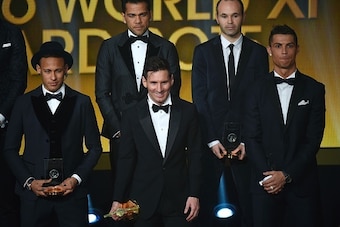 (From L) Brazil and FC Barcelona forward Neymar, Brazil and FC Barcelona defender Dani Alves, Argentina and FC Barcelona forward Lionel Messi, Spain and FC Barcelona midfielder Andres Iniesta and Portugal and Real Madrid forward Cristiano Ronaldo pose on 