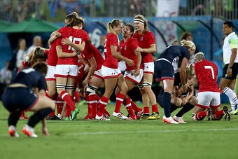 RIO DE JANEIRO, BRAZIL - AUGUST 08:  Team Canada celebrates their victory winning the Bronze medal after the Women's Bronze Medal Rugby Sevens match between Canada and Great Britain on Day 3 of the Rio 2016 Olympic Games at the Deodoro Stadium on August 8