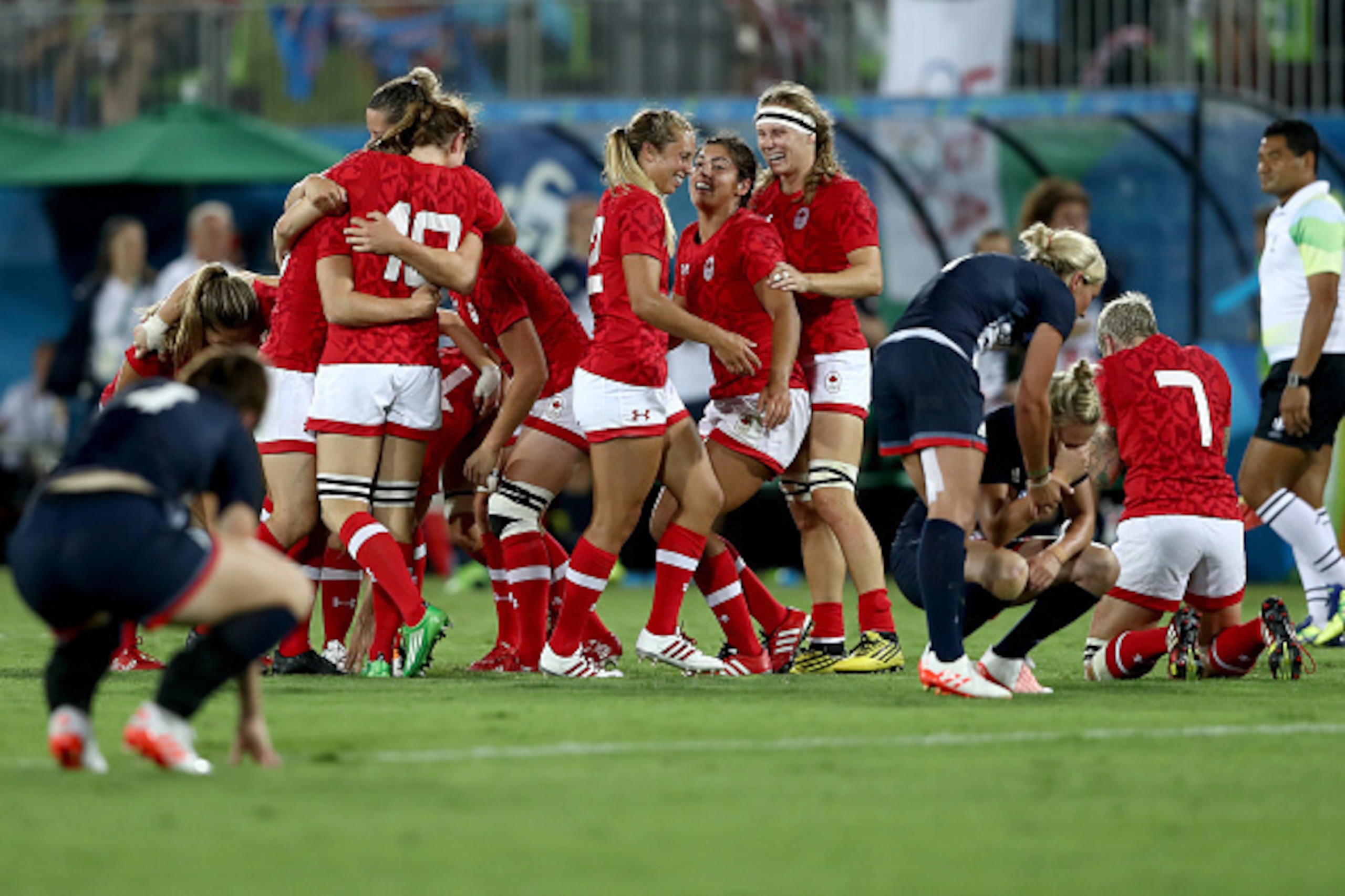 RIO DE JANEIRO, BRAZIL - AUGUST 08: Team Canada celebrates their victory winning the Bronze medal after the Women's Bronze Medal Rugby Sevens match between Canada and Great Britain on Day 3 of the Rio 2016 Olympic Games at the Deodoro Stadium on August 8 RIO DE JANEIRO, BRAZIL - AUGUST 08: Team Canada celebrates their victory winning the Bronze medal after the Women's Bronze Medal Rugby Sevens match between Canada and Great Britain on Day 3 of the Rio 2016 Olympic Games at the Deodoro Stadium on August 8