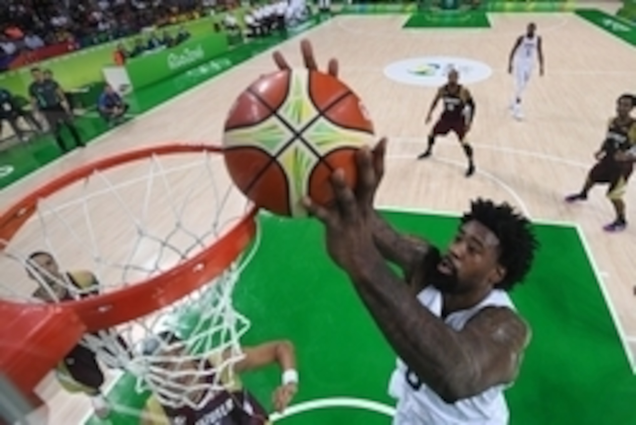 Aug 8, 2016; Rio de Janeiro, Brazil; United States center DeAndre Jordan (6) dunks the ball past Venezuela power forward Windi Graterol (15) during the men's basketball preliminary round in the Rio 2016 Summer Olympic Games at Carioca Arena 1. Mandatory C
