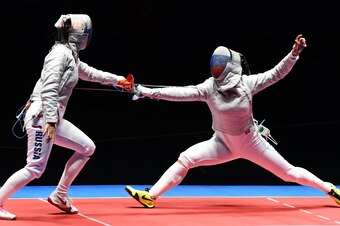 Aug 8, 2016; Rio de Janeiro, Brazil; Yana Egorian (RUS) faces off with Sofya Velikaya (RUS) during women's sabre individual competition in the Rio 2016 Summer Olympic Games at Carioca Arena 3. Mandatory Credit: Robert Hanashiro-USA TODAY Sports