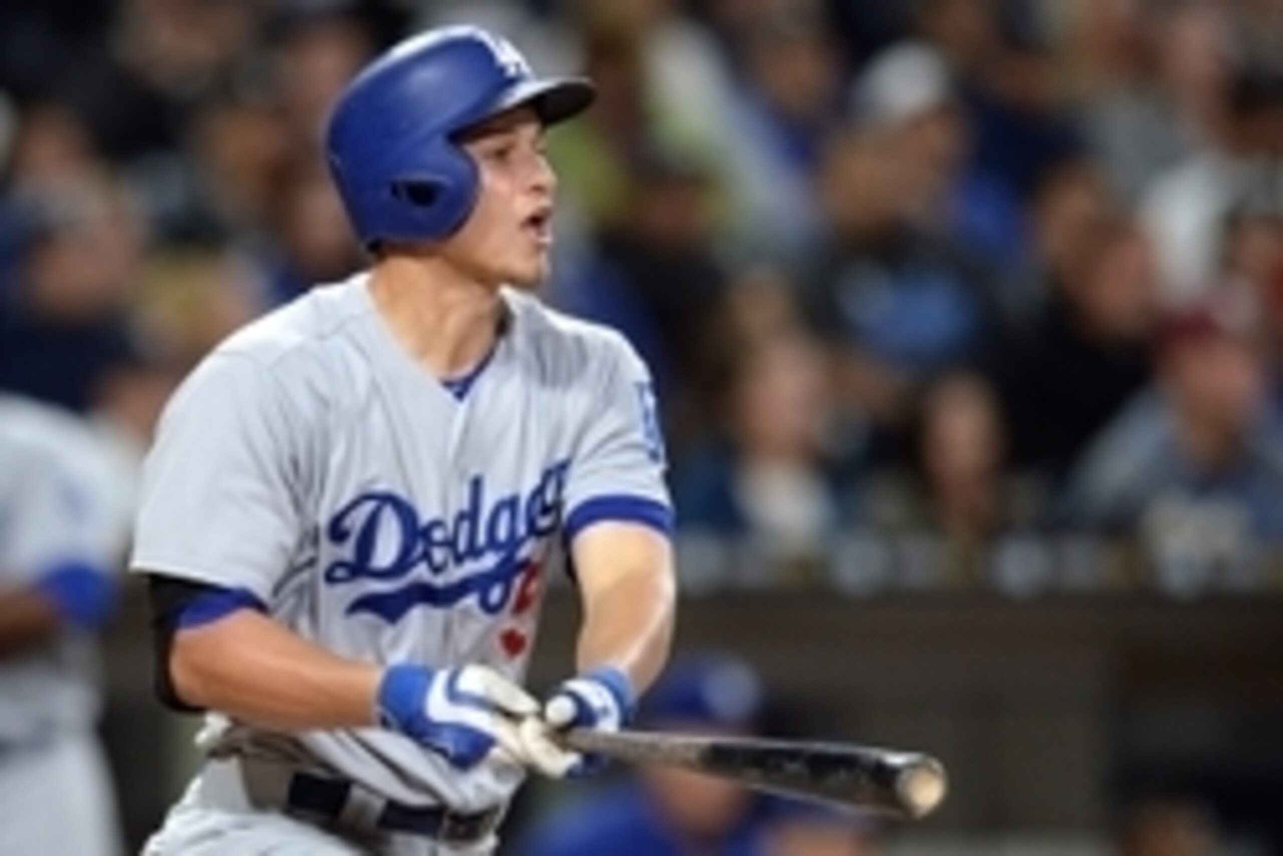 May 20, 2016; San Diego, CA, USA; Los Angeles Dodgers shortstop Corey Seager (5) hits an RBI double during the third inning against the San Diego Padres at Petco Park. Mandatory Credit: Jake Roth-USA TODAY Sports