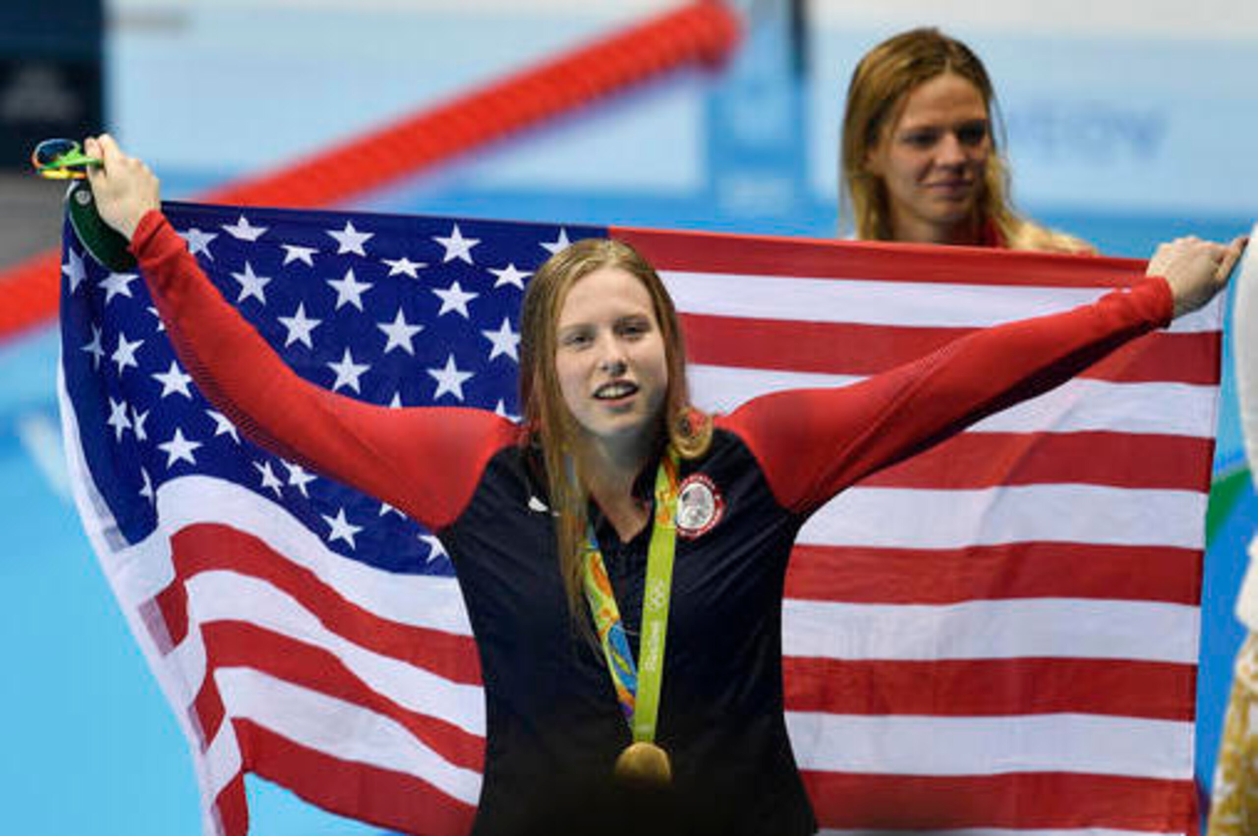 Yulia Efimova was a quiet observer as King donned the American flag.