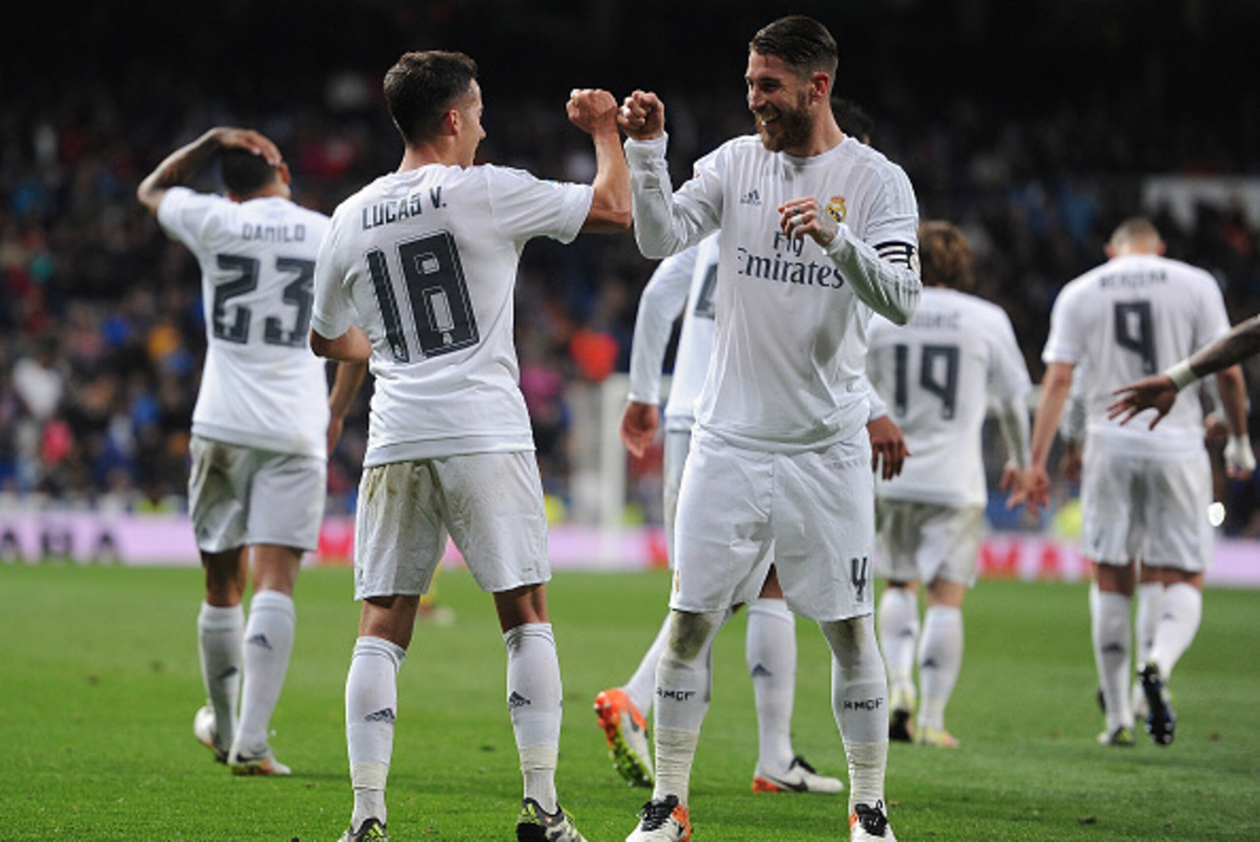 MADRID, SPAIN - APRIL 20: Lucas Vazquez of Real Madrid celebrates with Sergio Ramos after scoring Real's 2nd goal during the La Liga match between Real Madrid and Villarreal at Estadio Santiago Bernabeu on April 20, 2016 in Madrid, Spain. (Photo by Den MADRID, SPAIN - APRIL 20: Lucas Vazquez of Real Madrid celebrates with Sergio Ramos after scoring Real's 2nd goal during the La Liga match between Real Madrid and Villarreal at Estadio Santiago Bernabeu on April 20, 2016 in Madrid, Spain. (Photo by Den