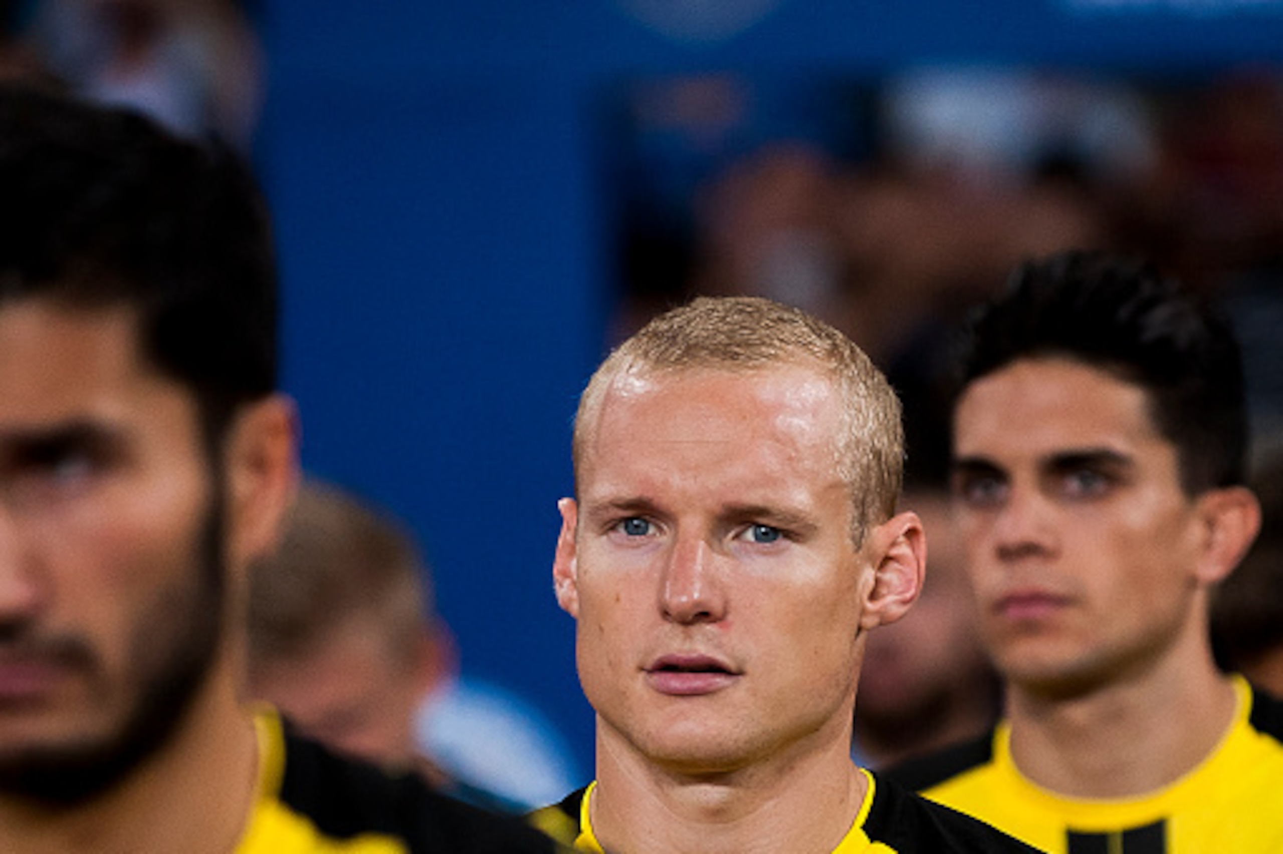 SHENZHEN - JULY 28: Borussia Dortmund midfielder Sebastian Rode (c) getting into the field for the match against Manchester City FC during their 2016 International Champions Cup China match at the Shenzhen Stadium on 28 July 2016 in Shenzhen, China. (Phot