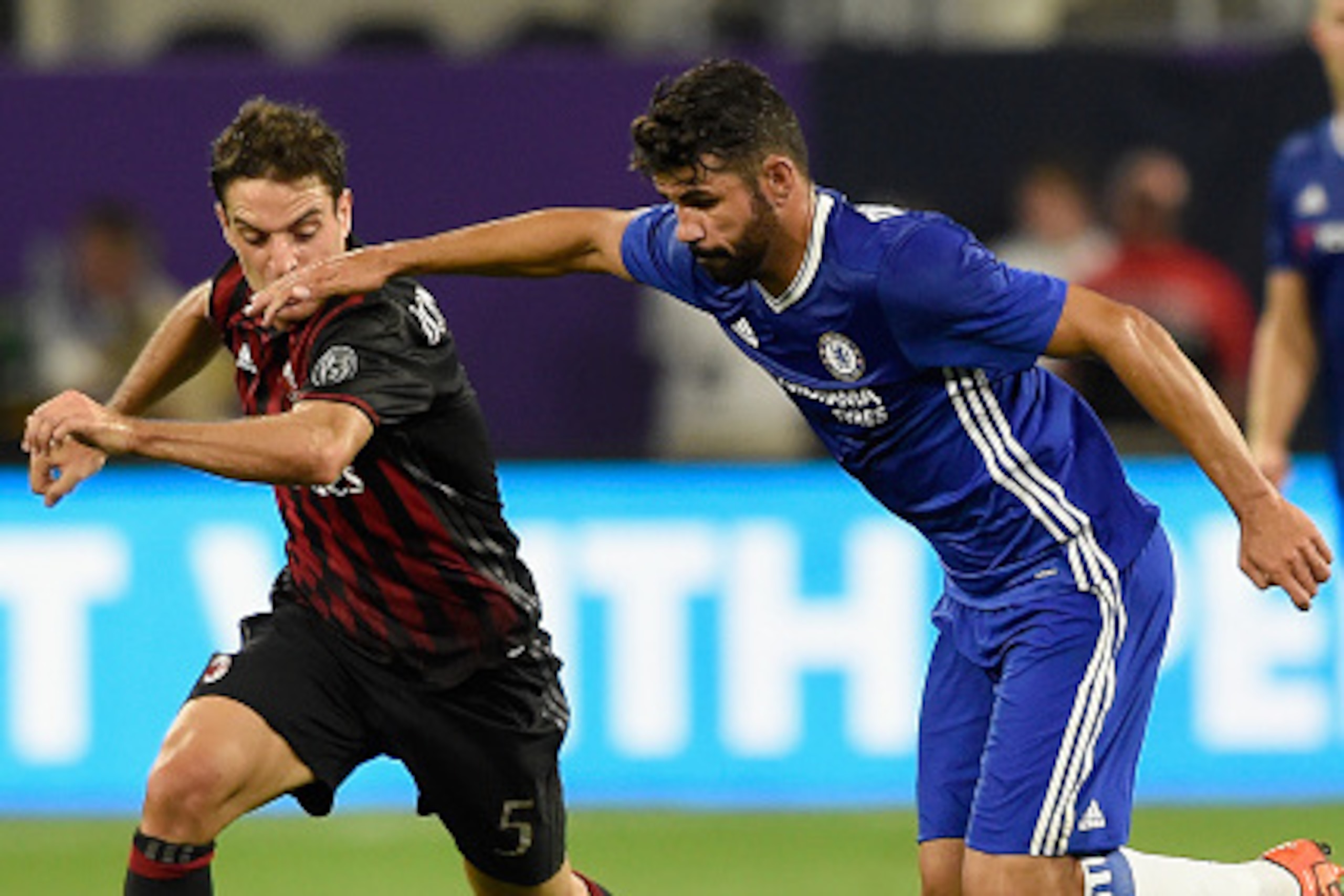 MINNEAPOLIS, MN - AUGUST 3: Giacomo Bonaventura #5 of AC Milan and Diego Costa #19 of Chelsea go after the ball during the first half of the International Champions Cup match on August 3, 2016 at U.S. Bank Stadium in Minneapolis, Minnesota. Chelsea defeat