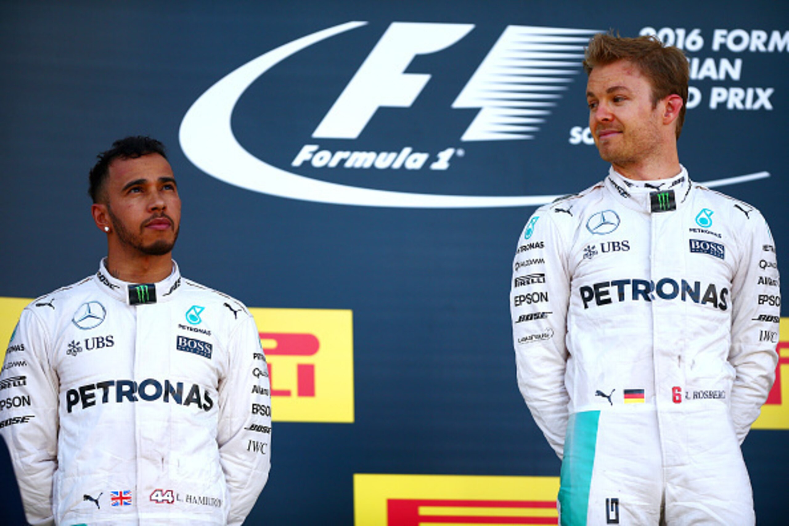 SOCHI, RUSSIA - MAY 01:  Nico Rosberg of Germany and Mercedes GP looks at his team-mate Lewis Hamilton of Great Britain and Mercedes GP as he celebrates his win on the podium during the Formula One Grand Prix of Russia at Sochi Autodrom on May 1, 2016 in 