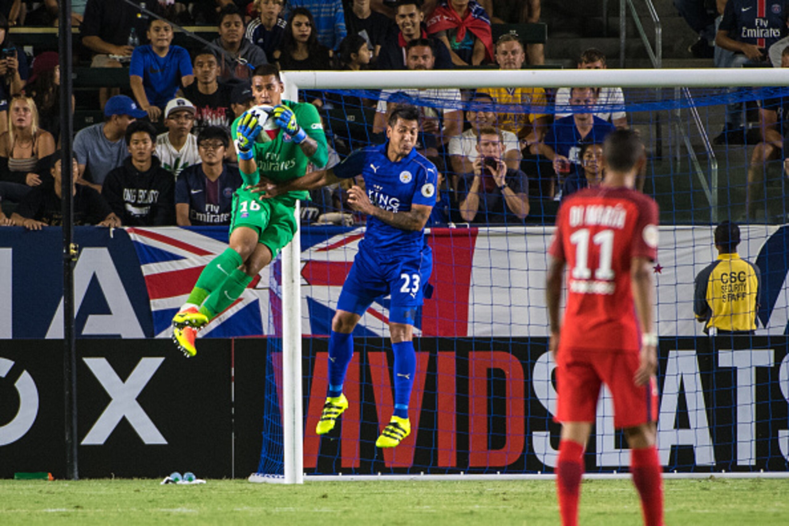 CARSON, CA - JULY 30: Alphonse Areola #16 of Paris Saint-Germain catches the ball as Leonardo Ulloa #23 of Leicester City attacks during the International Champions Cup 2016 match between Paris Saint-Germain and Leicester City at StubHub Center on July 30