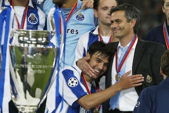 GELSENKIRCHEN, GERMANY - MAY 26:  Nuno Valente of FC Porto hugs his manager Jose Dos Santos Mourinho after winning the Champions League during the UEFA Champions League Final match between AS Monaco and FC Porto at the AufSchake Arena on May 26, 2004 in G