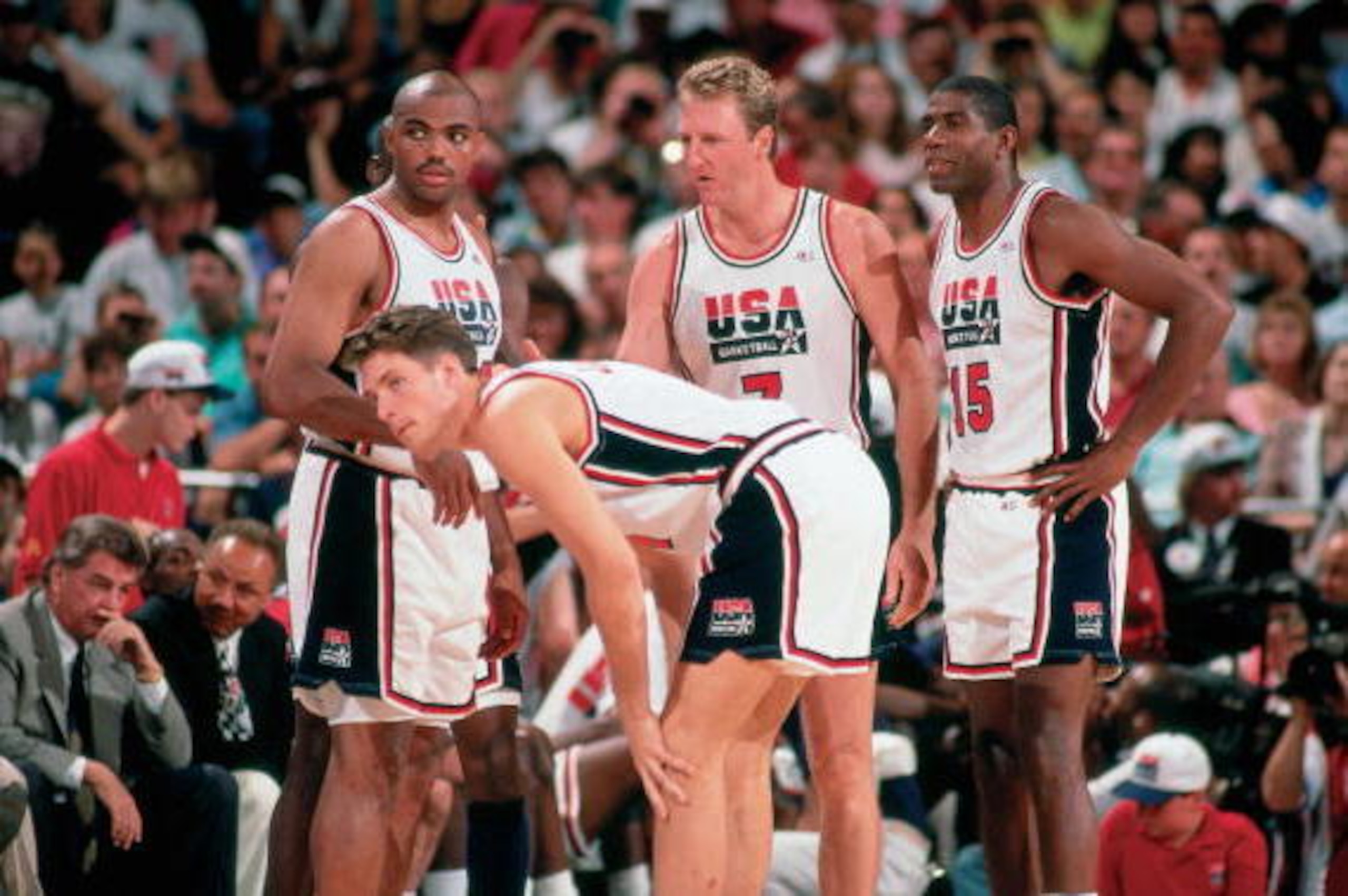 BARCELONA, SPAIN - 1992: (L-R) Charles Barkley, Christian Laettner, Larry Bird #7 and Magic Johnson #15 of the United States National Team discuss strategy during the1992 Summer Olympics in Barcelona, Spain. NOTE TO USER: User expressly acknowledges tha BARCELONA, SPAIN - 1992: (L-R) Charles Barkley, Christian Laettner, Larry Bird #7 and Magic Johnson #15 of the United States National Team discuss strategy during the1992 Summer Olympics in Barcelona, Spain. NOTE TO USER: User expressly acknowledges tha