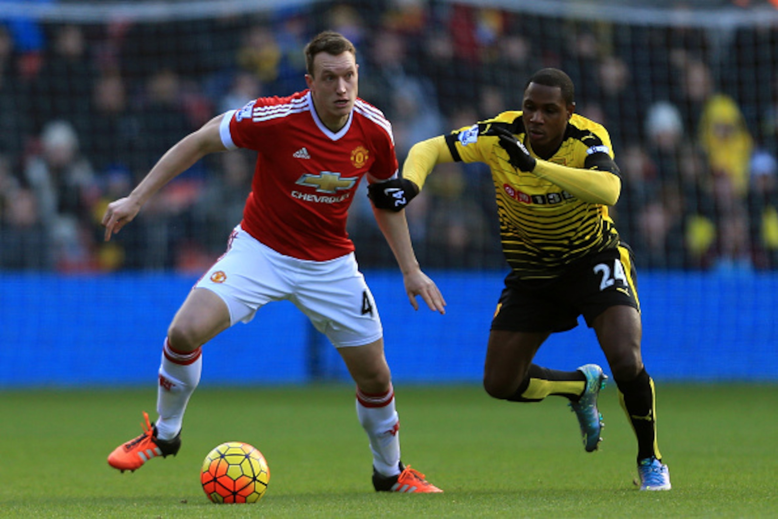 WATFORD, ENGLAND - NOVEMBER 21: Phil Jones of Manchester United and Odion Ighalo of Watford compete for the ball during the Barclays Premier League match between Watford and Manchester United at Vicarage Road on November 21, 2015 in Watford, England. (Ph WATFORD, ENGLAND - NOVEMBER 21: Phil Jones of Manchester United and Odion Ighalo of Watford compete for the ball during the Barclays Premier League match between Watford and Manchester United at Vicarage Road on November 21, 2015 in Watford, England. (Ph