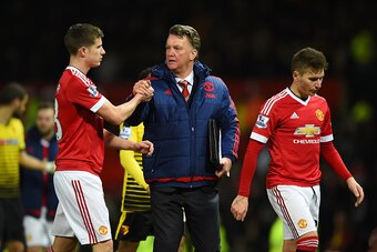 MANCHESTER, ENGLAND - MARCH 02:  Louis van Gaal Manager of Manchester United shakes hands with Paddy McNair after the Barclays Premier League match between Manchester United and Watford at Old Trafford on March 2, 2016 in Manchester, England.  (Photo by S