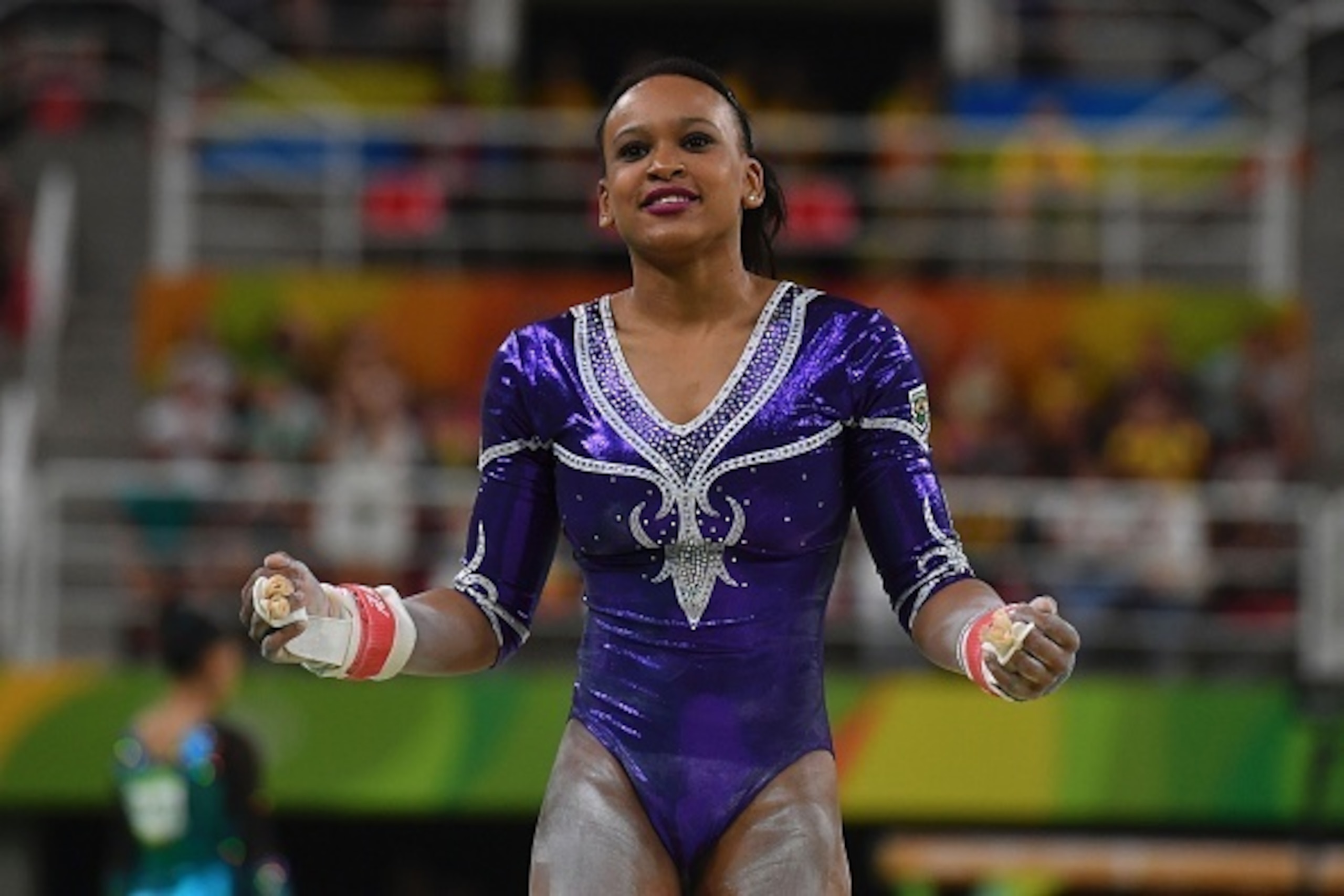 Brazil's Rebeca Andrade competes in the qualifying for the women's Uneven Bars event of the Artistic Gymnastics at the Olympic Arena during the Rio 2016 Olympic Games in Rio de Janeiro on August 7, 2016. / AFP / Ben STANSALL        (Photo credit should re