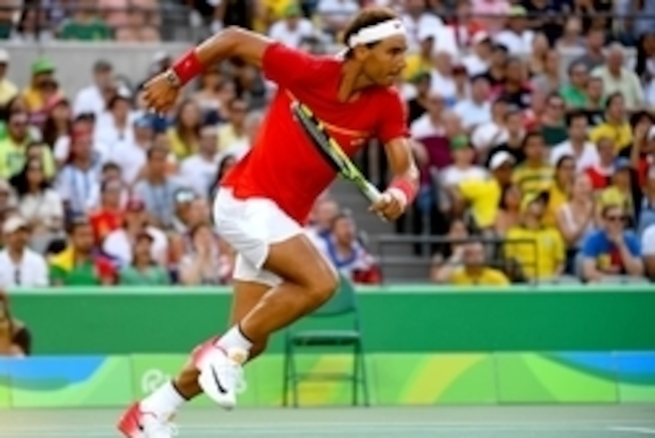 Aug 9, 2016; Rio de Janeiro, Brazil; Rafael Nadal (ESP) runs to the ball as he plays Andreas Seppi (ITA) during a second round tennis match at Olympic Tennis Centre in the Rio 2016 Summer Olympic Games. Mandatory Credit: Christopher Hanewinckel-USA TODAY 