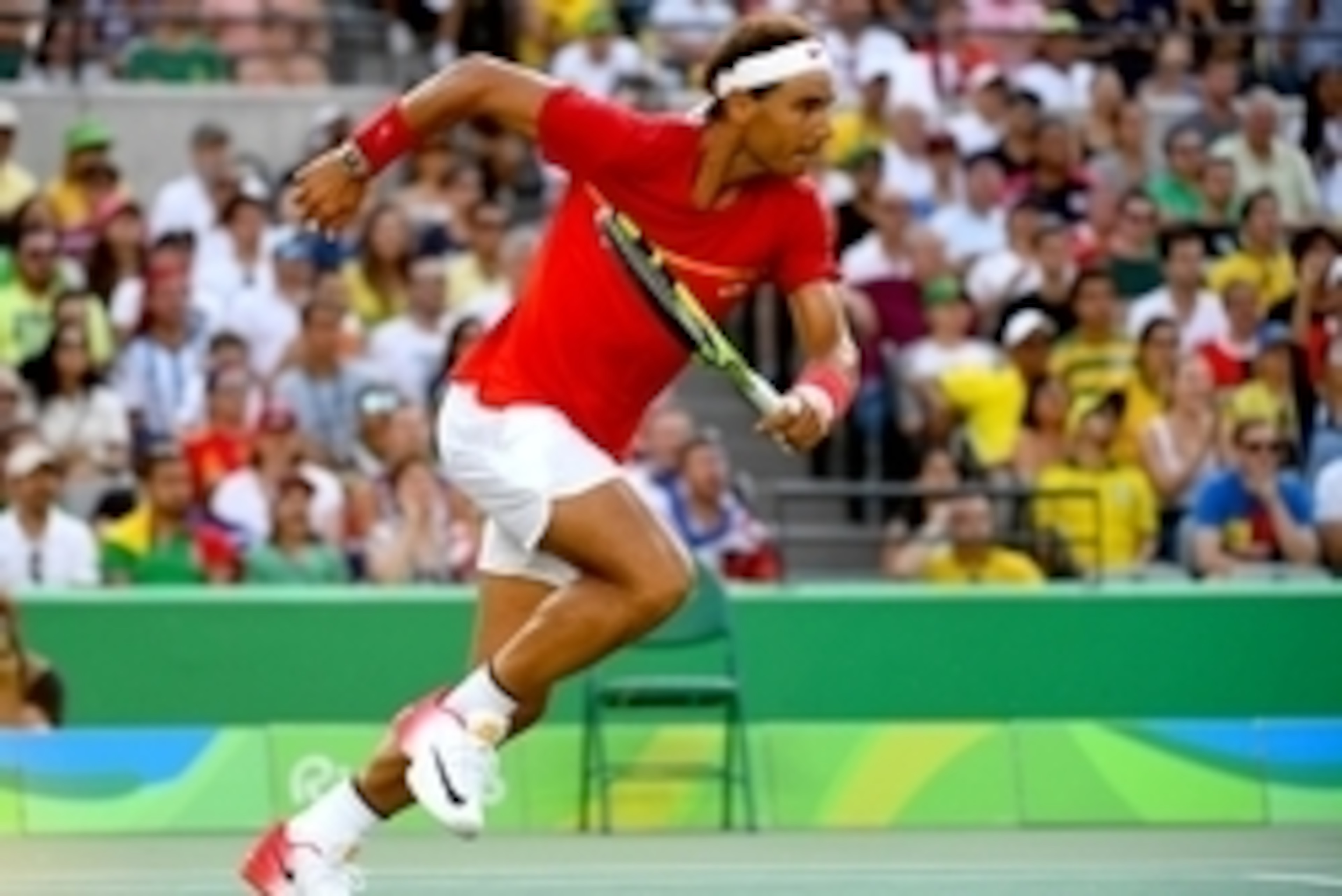 Aug 9, 2016; Rio de Janeiro, Brazil; Rafael Nadal (ESP) runs to the ball as he plays Andreas Seppi (ITA) during a second round tennis match at Olympic Tennis Centre in the Rio 2016 Summer Olympic Games. Mandatory Credit: Christopher Hanewinckel-USA TODAY 