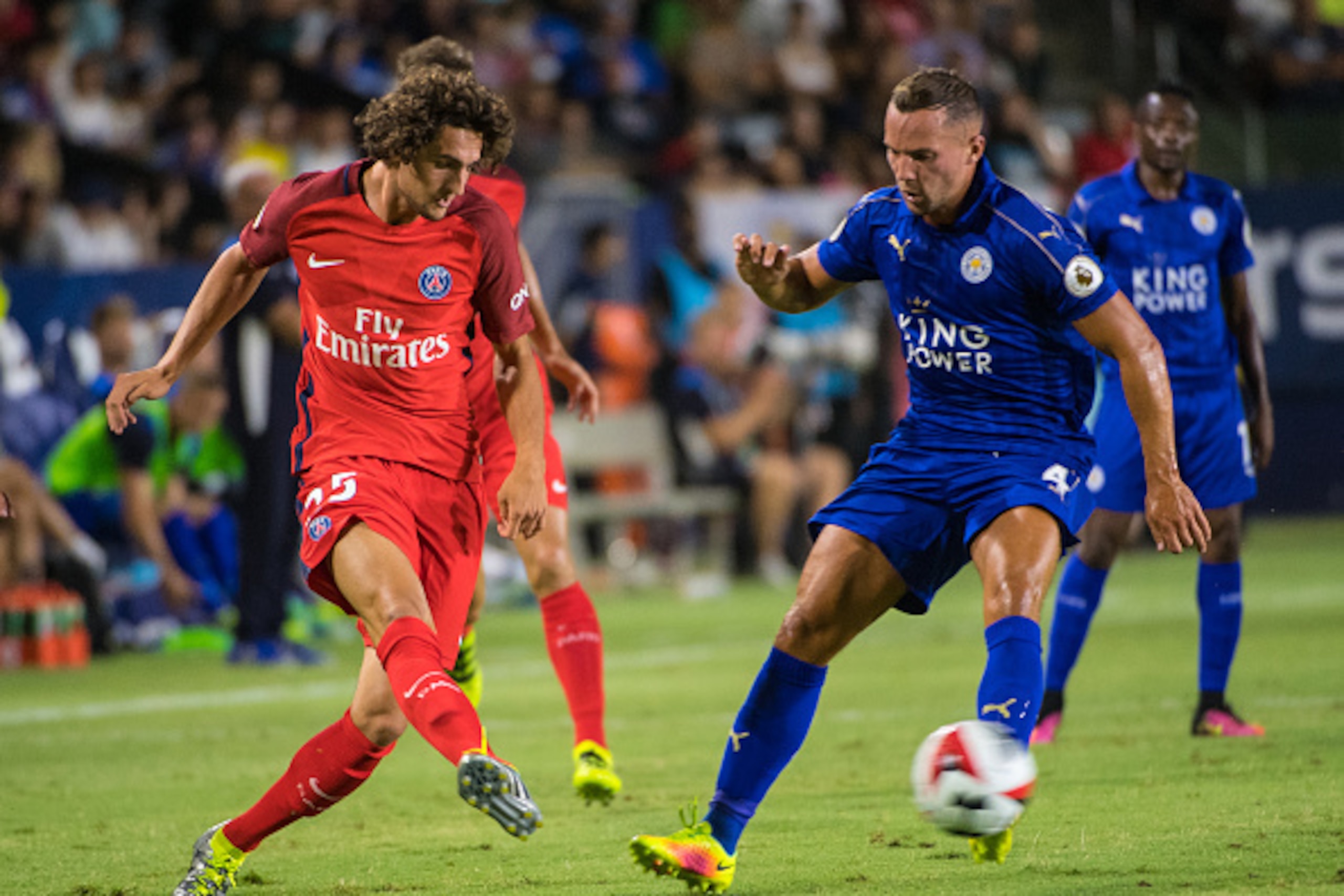 CARSON, CA - JULY 30: Adrien Rabiot #25 of Paris Saint-Germain passes the ball as Daniel Drinkwater #4 of Leicester City defends during the International Champions Cup 2016 match between Paris Saint-Germain and Leicester City at StubHub Center on July 30,