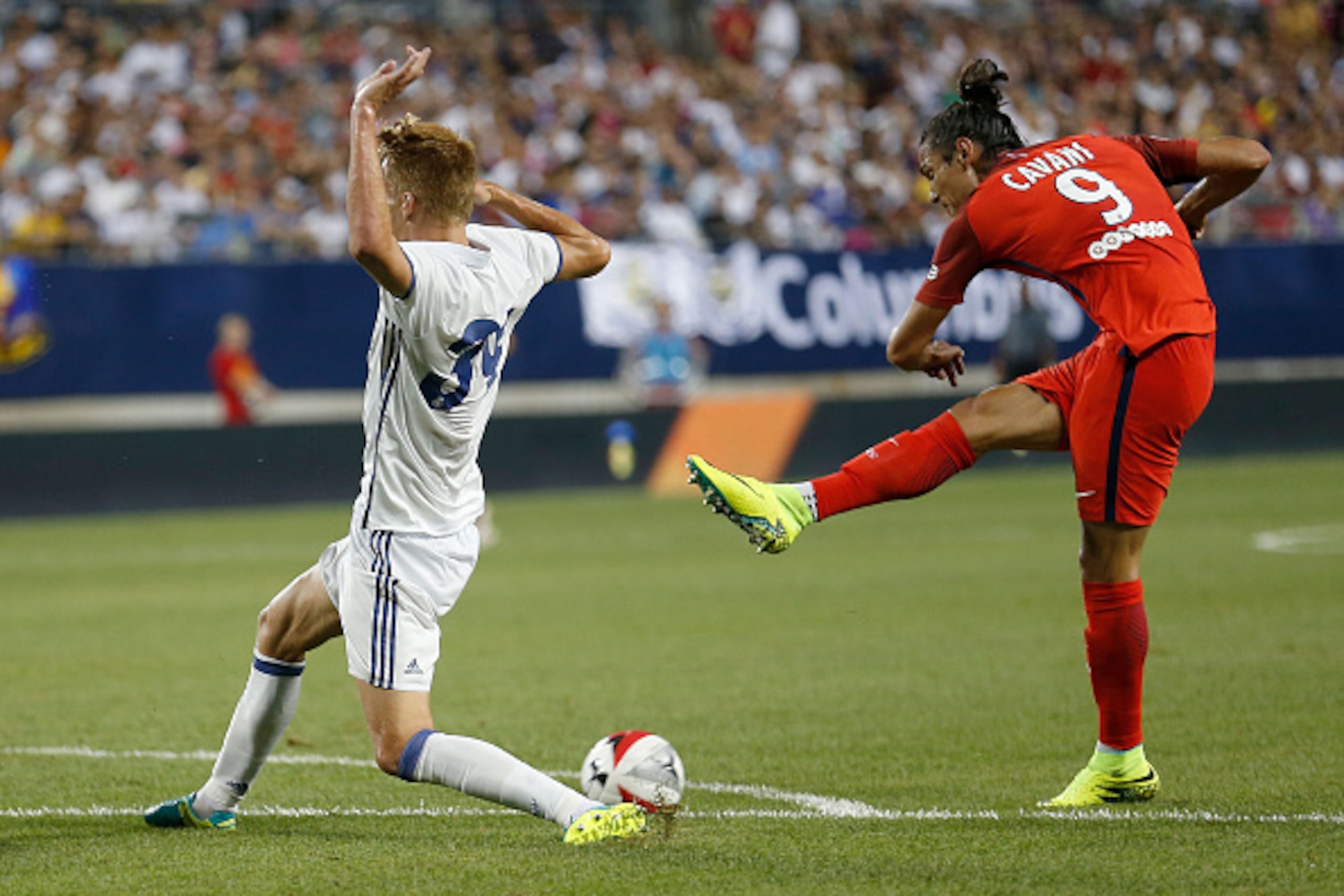 COLUMBUS, OH - JULY 27:  Philipp Lienhart #34 of Real Madrid C.F. blocks a shot from Edinson Cavani #9 of Paris Saint-Germain F.C during the second half on July 27, 2016 at Ohio Stadium in Columbus, Ohio. Paris Saint-Germain F.C. defeated Real Madrid C.F.
