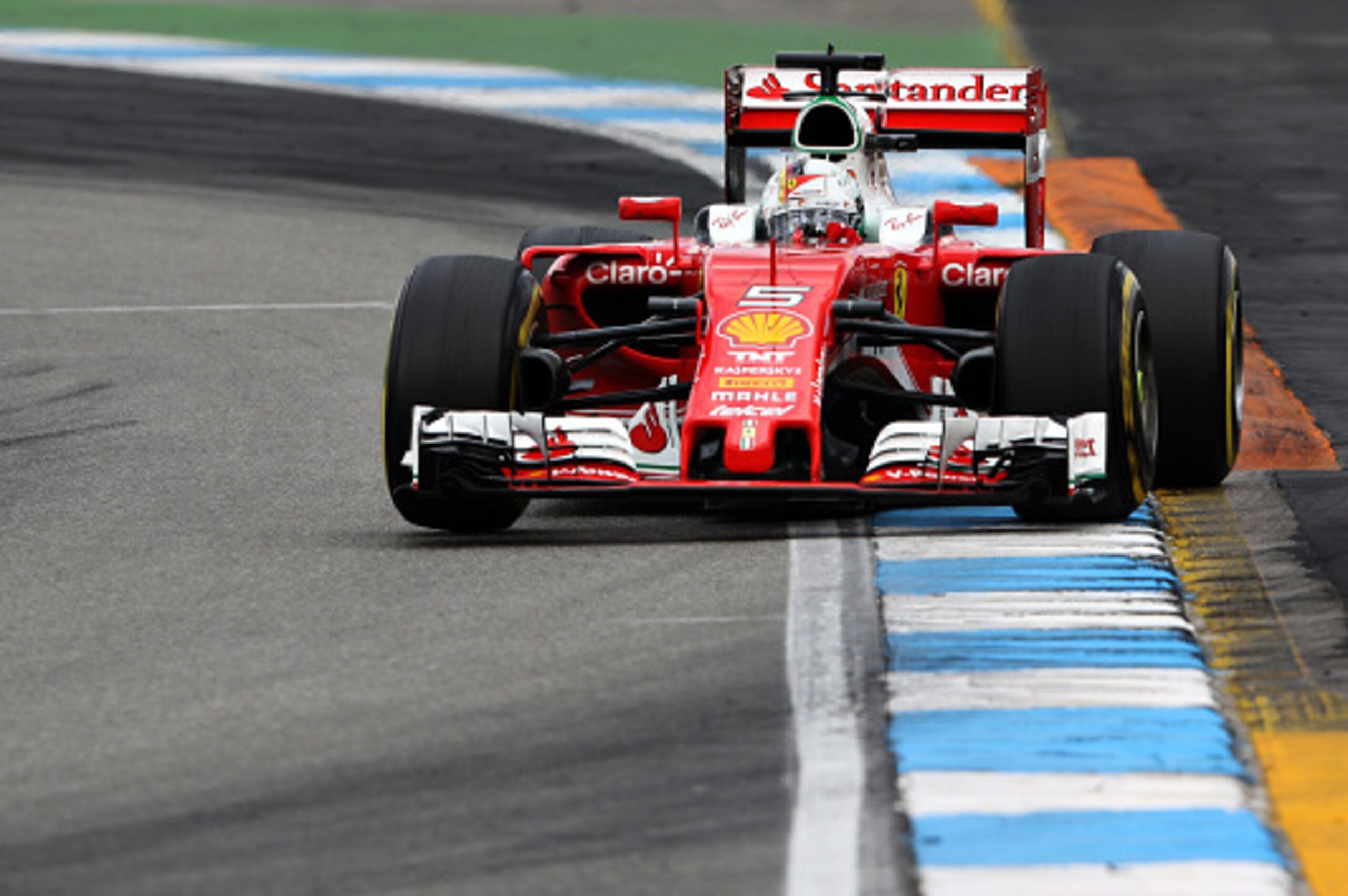HOCKENHEIM, GERMANY - JULY 31: Sebastian Vettel of Germany driving the (5) Scuderia Ferrari SF16-H Ferrari 059/5 turbo (Shell GP) on track during the Formula One Grand Prix of Germany at Hockenheimring on July 31, 2016 in Hockenheim, Germany.  (Photo by M