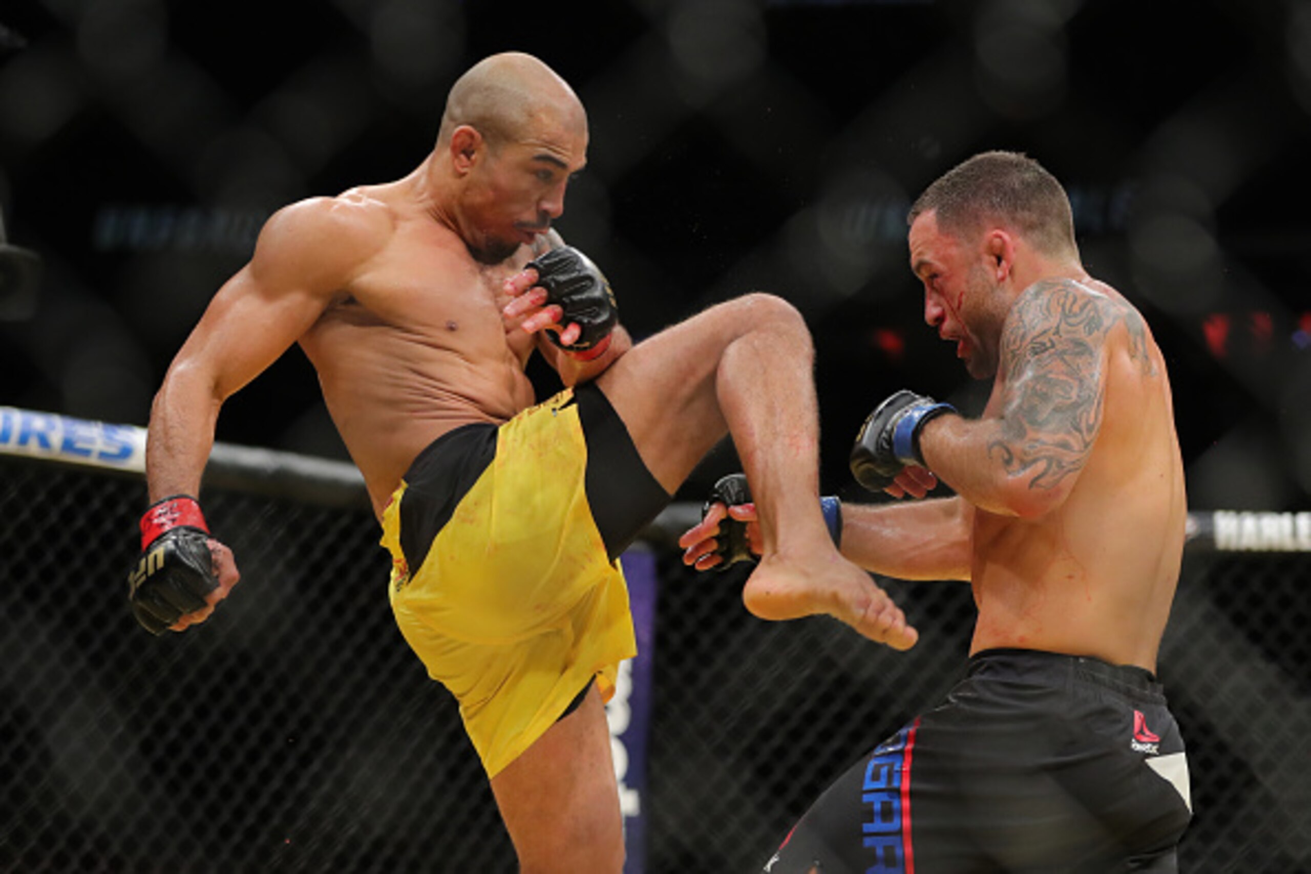 LAS VEGAS, NV - JULY 9: Jose Aldo looks to land a high knee on Frankie Edgar during the UFC 200 event at T-Mobile Arena on July 9, 2016 in Las Vegas, Nevada. (Photo by Rey Del Rio/Getty Images)