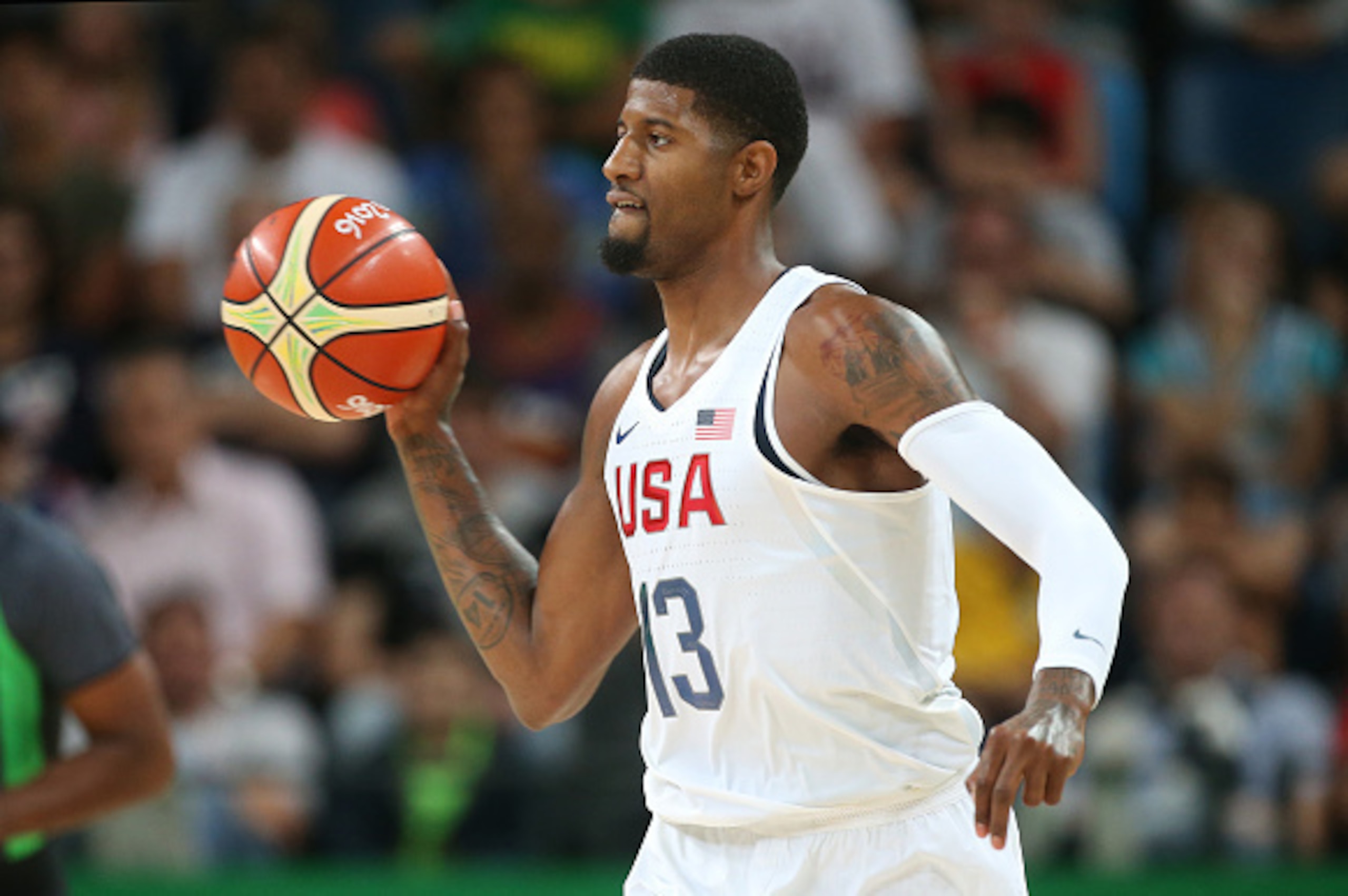 RIO DE JANEIRO, BRAZIL - AUGUST 8: Paul George of USA in action during the men's basketball match between USA and Venezuela at Arena Carioca 1 on day 3 of the Rio 2016 Olympic Games on August 8, 2016 in Rio de Janeiro, Brazil. (Photo by Jean Catuffe/Getty