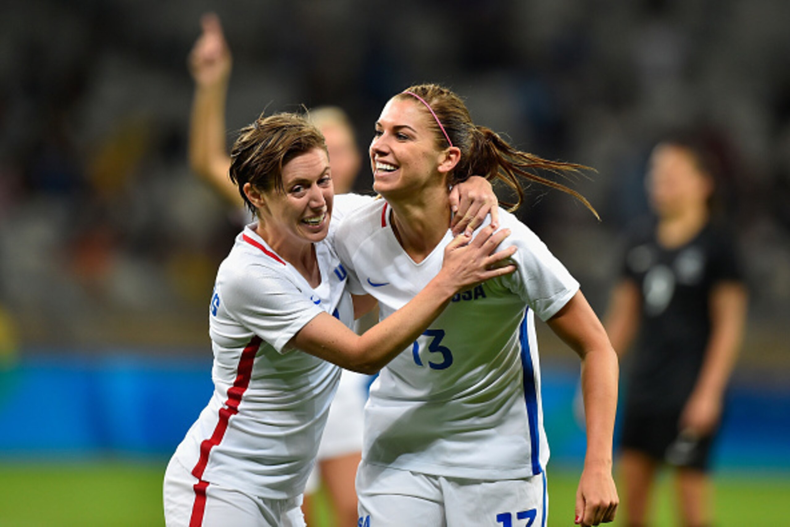 BELO HORIZONTE, BRAZIL - AUGUST 03: Alex Morgan #13 of United States and teammate Meghan Klingenberg celebrate after Morgan scores in the Women's Group G first round match between the United States and New Zealand during the Rio 2016 Olympic Games at Mine