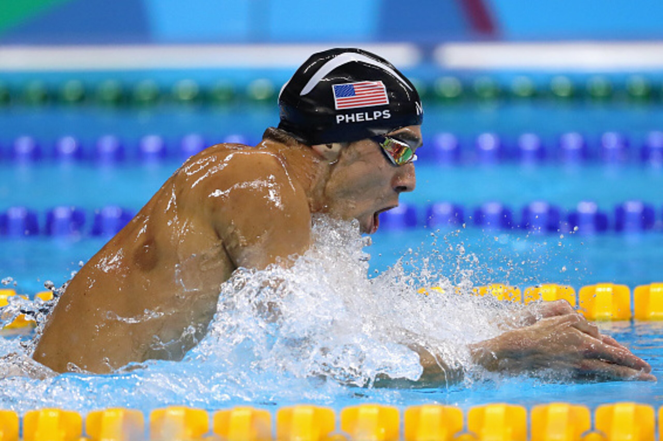 RIO DE JANEIRO, BRAZIL - AUGUST 10:  Michael Phelps of the United States competes in the second Semifinal of the Men's 200m Individual Medley on Day 5 of the Rio 2016 Olympic Games at the Olympic Aquatics Stadium on August 10, 2016 in Rio de Janeiro, Braz