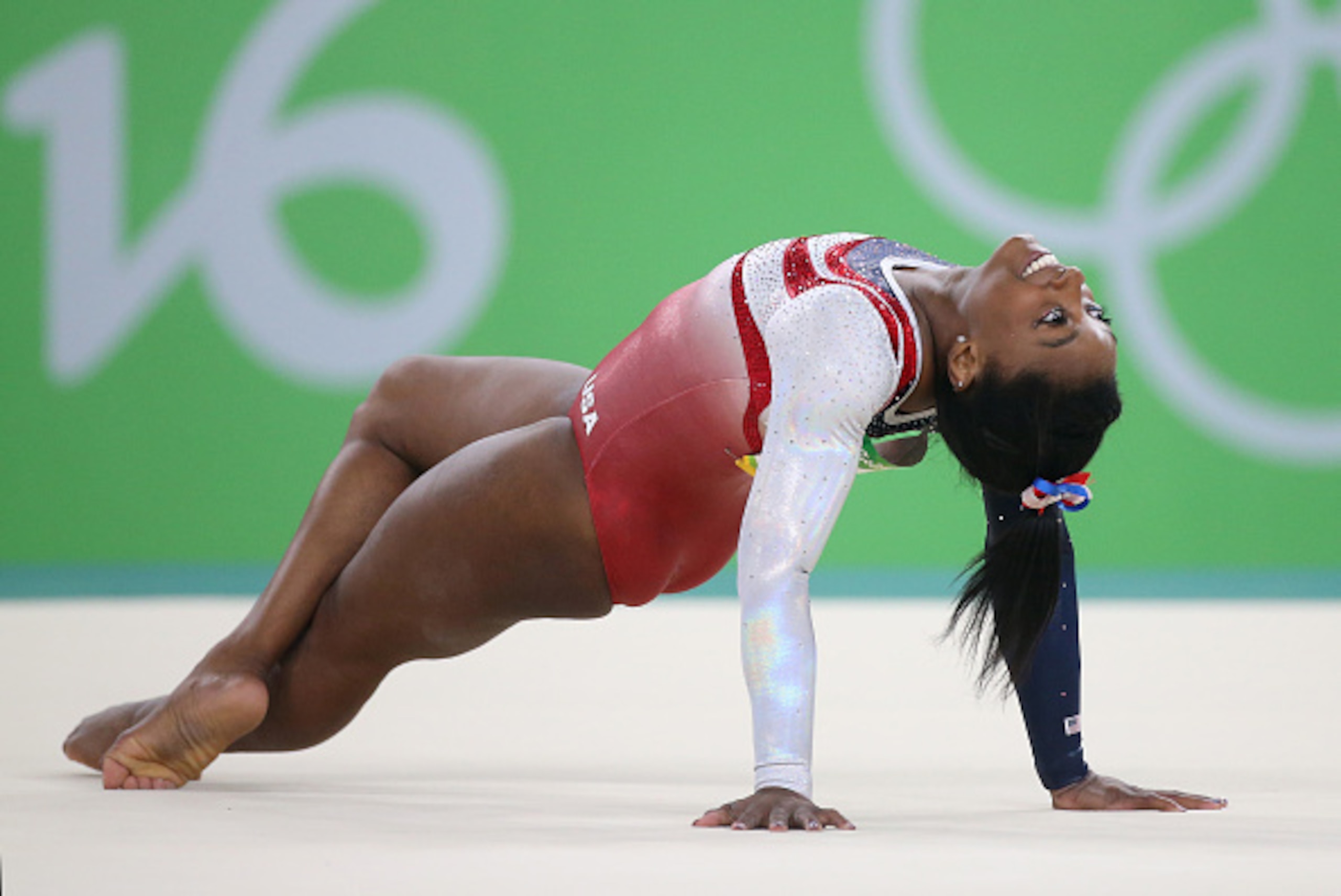RIO DE JANEIRO, BRAZIL - AUGUST 9: Simone Biles of USA competes in the Artistic Gymnastics women's team final on day 4 of the Rio 2016 Olympic Games at Rio Olympic Arena on August 9, 2016 in Rio de Janeiro, Brazil. (Photo by Jean Catuffe/Getty Images)