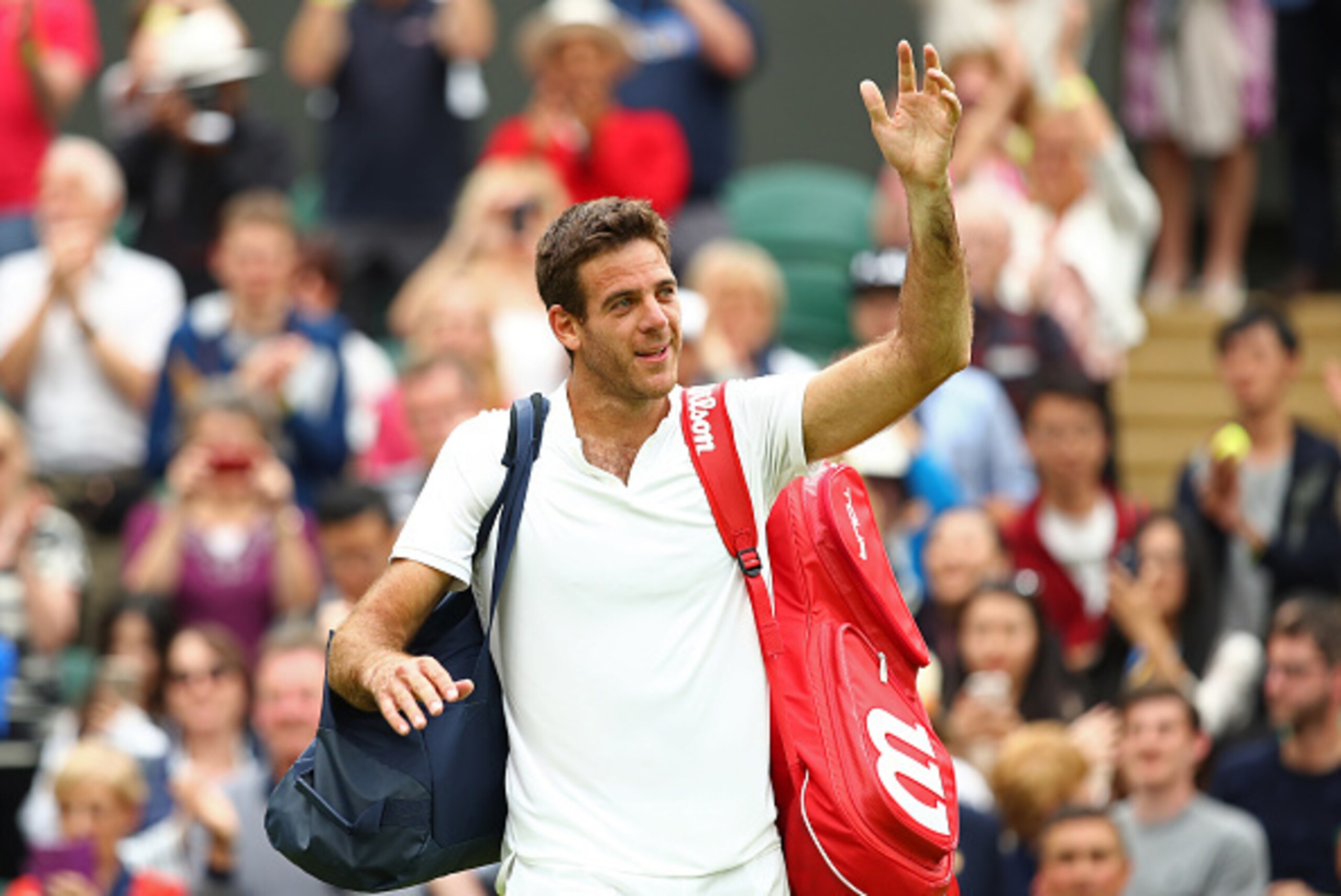 LONDON, ENGLAND - JULY 01:  Juan Martin Del Potro of Argentina celebrates victory during the Men's Singles second round match against Stan Wawrinka of Switzerland on day five of the Wimbledon Lawn Tennis Championships at the All England Lawn Tennis and Cr