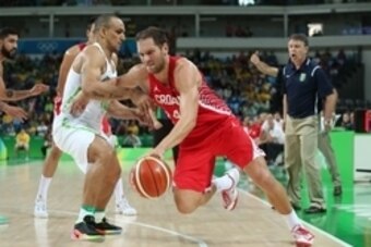 Aug 11, 2016; Rio de Janeiro, Brazil; Croatia shooting guard Bojan Bogdanovic (44) works around Brazil guard Alex Garcia (10) during the men's preliminary round in the Rio 2016 Summer Olympic Games at Carioca Arena 1. Mandatory Credit: Jeff Swinger-USA TO