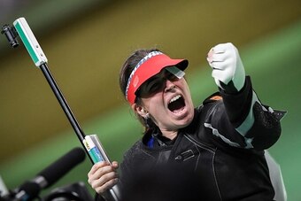 TOPSHOT - Germany's Barbara Engleder reacts after winning the 50m rifle 3 positions women shooting event at the Rio 2016 Olympic Games at the Olympic Shooting Centre in Rio de Janeiro on August 11, 2016. / AFP / PHILIPPE LOPEZ        (Photo credit should 