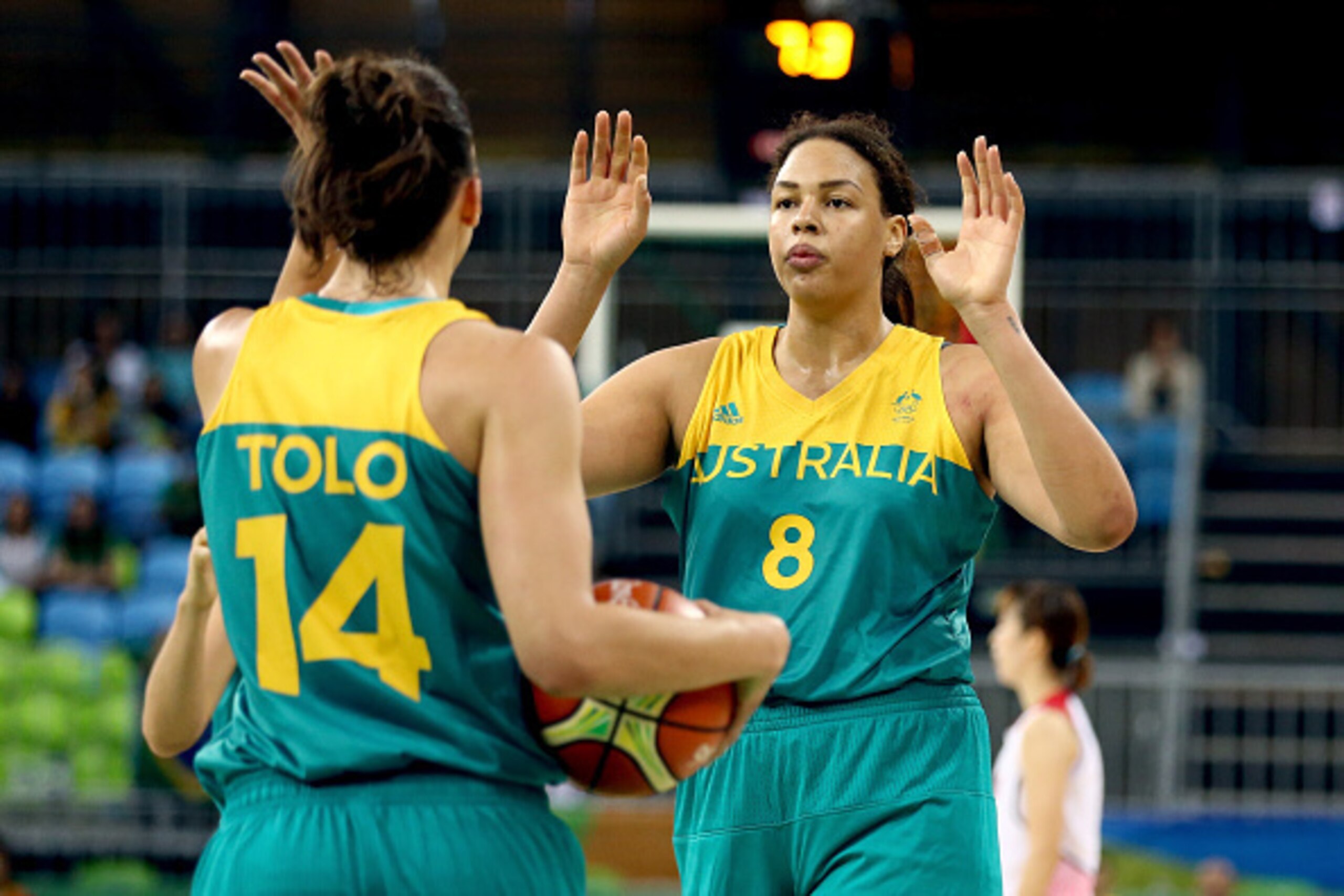 RIO DE JANEIRO, BRAZIL - AUGUST 11: Marianna Tolo #14 and Elizabeth Cambage #8 of Australia celebrate against Japan during a Women's Preliminary Group B match on Day 6 of the Rio 2016 Olympics at the Youth Arena on August 11, 2016 in Rio de Janeiro, Braz RIO DE JANEIRO, BRAZIL - AUGUST 11: Marianna Tolo #14 and Elizabeth Cambage #8 of Australia celebrate against Japan during a Women's Preliminary Group B match on Day 6 of the Rio 2016 Olympics at the Youth Arena on August 11, 2016 in Rio de Janeiro, Braz