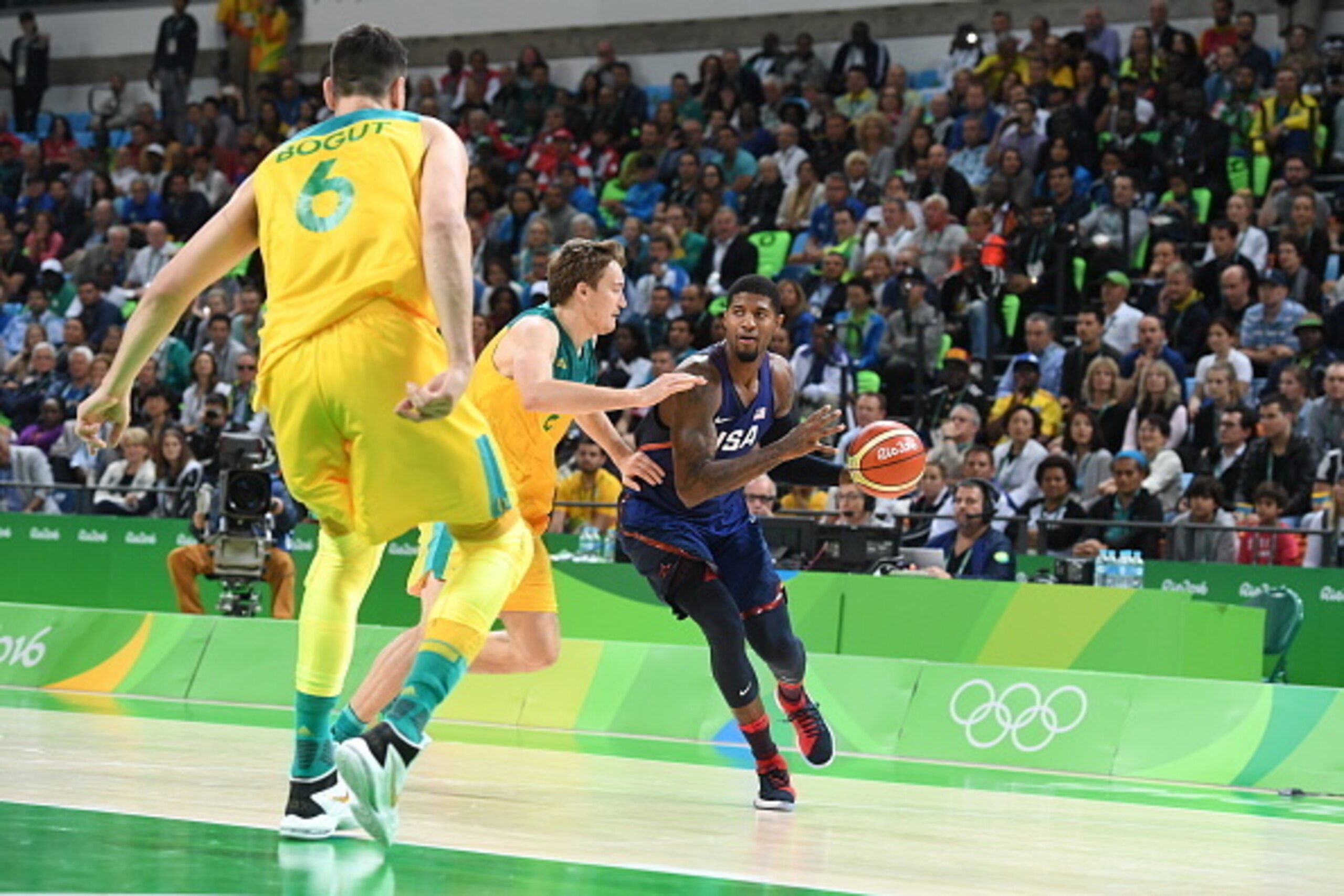 RIO DE JANEIRO, BRAZIL - AUGUST 10:  Paul George #13 of the USA Basketball Men's National Team drives to the basket against Australia on Day 5 of the Rio 2016 Olympic Games on August 10, 2016 at Barra Carioca Arena 1 in Rio de Janerio, Brazil. NOTE TO USE