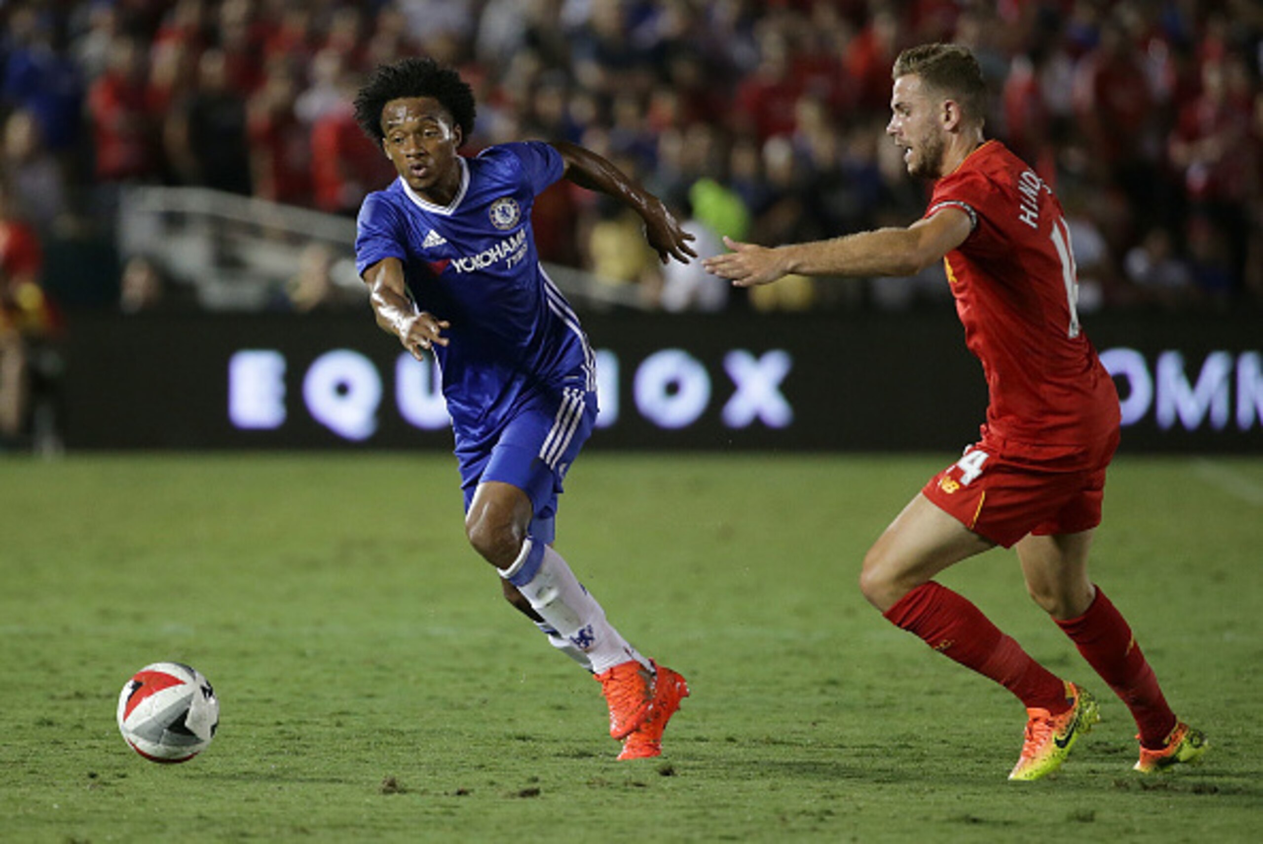 PASADENA, CA - JULY 27:  Juan Cuadrado #17 of Chelsea is defended by Jordan Henderson #14 of Liverpool during the 2016 International Champions Cup at Rose Bowl on July 27, 2016 in Pasadena, California.  (Photo by Jeff Gross/Getty Images)