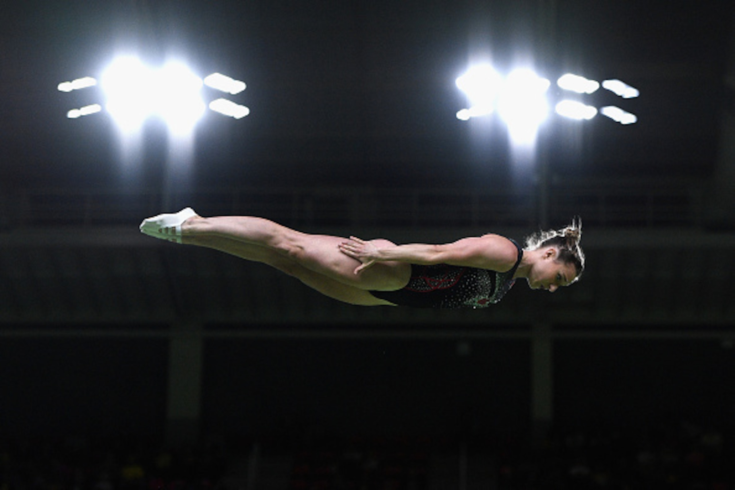 RIO DE JANEIRO, BRAZIL - AUGUST 12:  Rosannagh Maclennan of Canada competes during the Trampoline Gymnastics Women's Qualification on Day 7 of the Rio 2016 Olympic Games at the Rio Olympic Arena on August 12, 2016 in Rio de Janeiro, Brazil.  (Photo by Dav