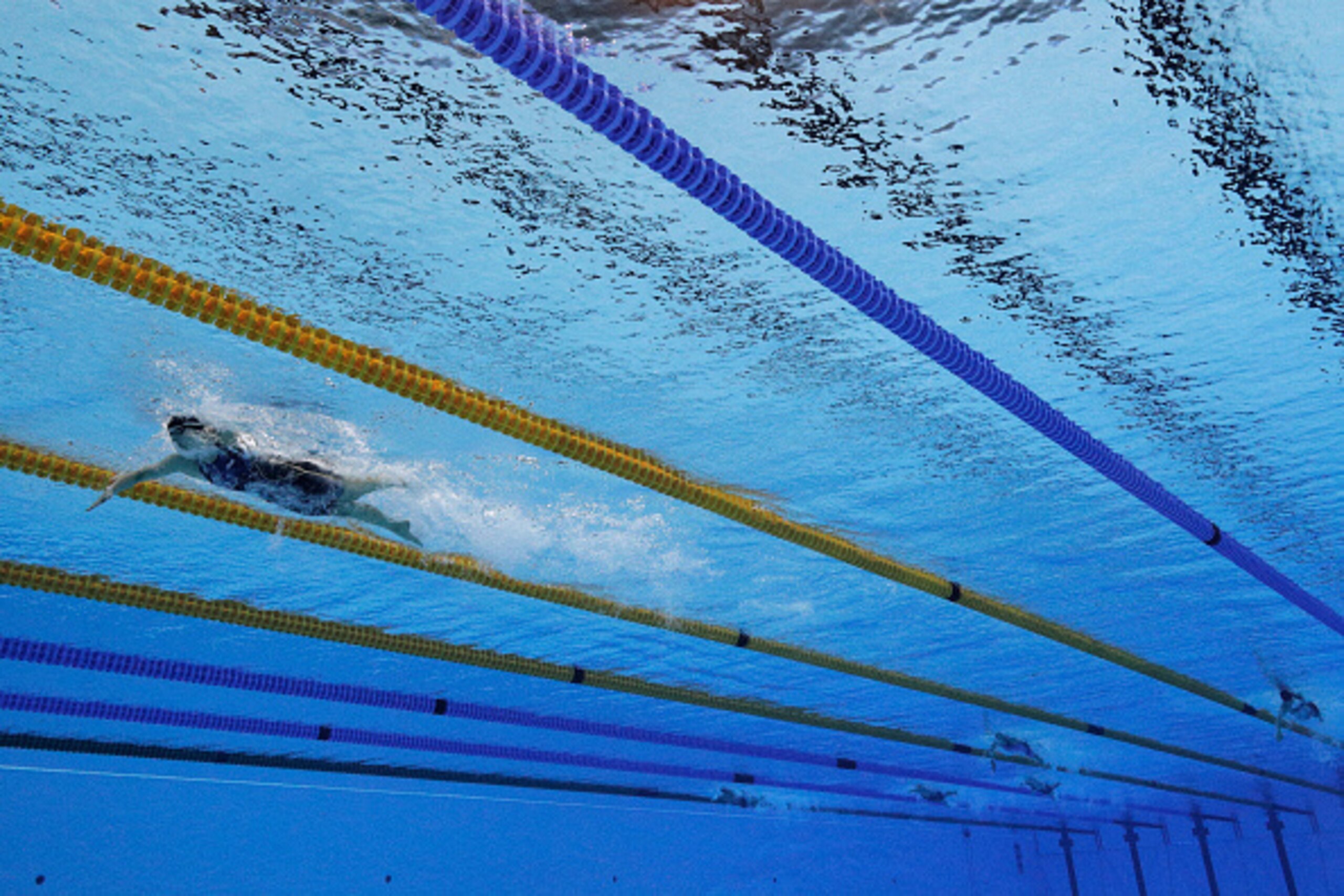 RIO DE JANEIRO, BRAZIL - AUGUST 12: Katie Ledecky of the United States leads the field in the Women's 800m Freestyle Final on Day 7 of the Rio 2016 Olympic Games at the Olympic Aquatics Stadium on August 12, 2016 in Rio de Janeiro, Brazil. (Photo by Ada RIO DE JANEIRO, BRAZIL - AUGUST 12: Katie Ledecky of the United States leads the field in the Women's 800m Freestyle Final on Day 7 of the Rio 2016 Olympic Games at the Olympic Aquatics Stadium on August 12, 2016 in Rio de Janeiro, Brazil. (Photo by Ada
