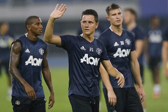 BEIJING, CHINA - JULY 24:  Ander Herrera of Manchester United waves to fans during the team training session for the 2016 International Champions Cup match between Manchester City and Manchester United at Olympic Sports Center Stadium on July 24, 2016 in 