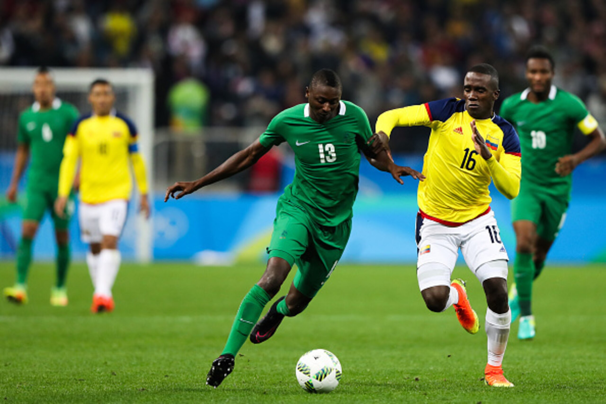 SAO PAULO, BRAZIL - AUGUST 10: Sadiq Umar (L) of Nigeria and Kevin Balanta of Colombia in action during the match between Colombia and Nigeria mens football for the Olympic Games Rio 2016 at Arena Corinthians on August 10, 2016 in Sao Paulo, Brazil. (Phot