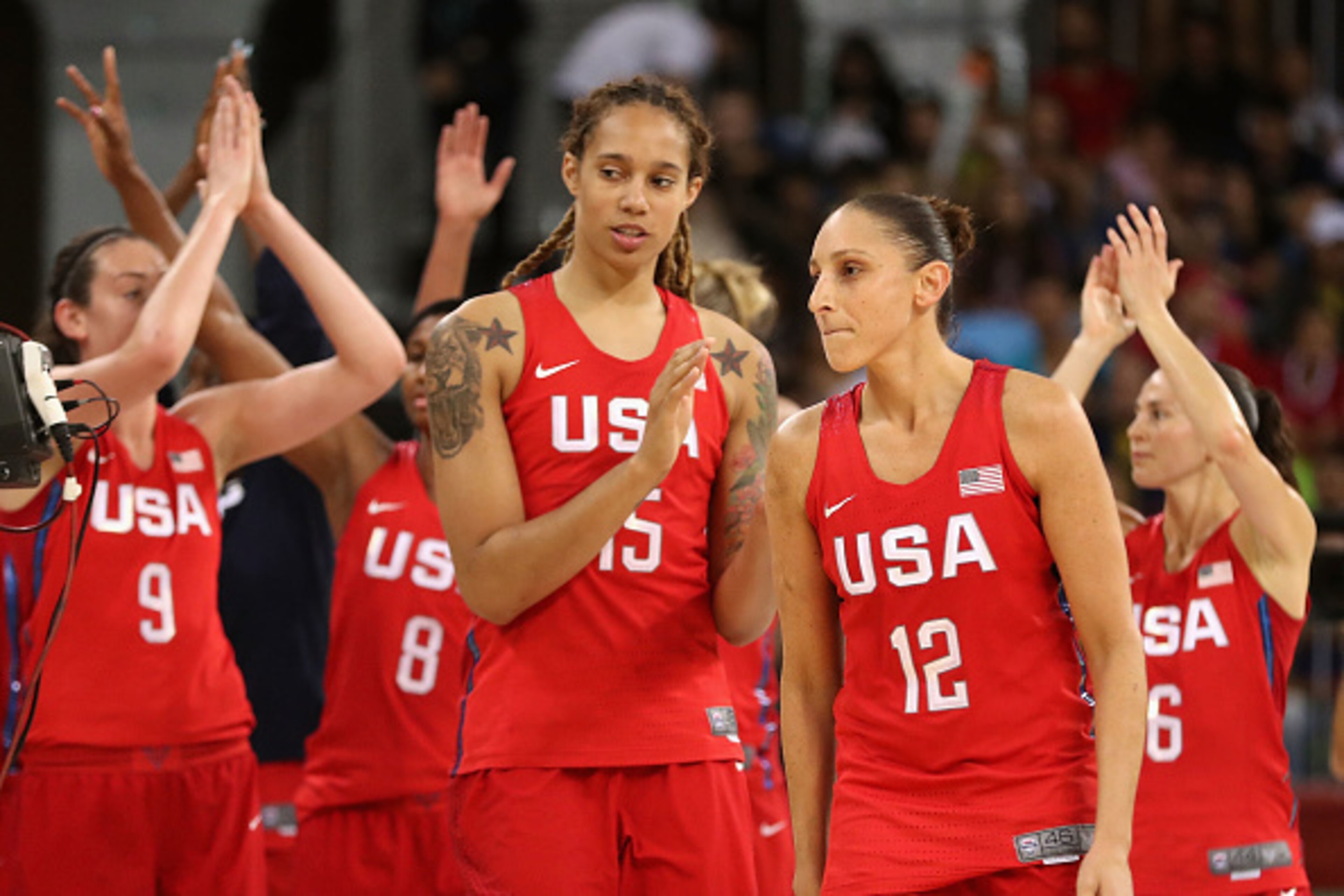 RIO DE JANEIRO, BRAZIL - AUGUST 12:  Brittney Griner #15 and Diana Taurasi #12 of United States celebrate after defeating Canada in the women's basketball game on Day 7 of the Rio 2016 Olympic Games at the Youth Arena on August 12, 2016 in Rio de Janeiro,