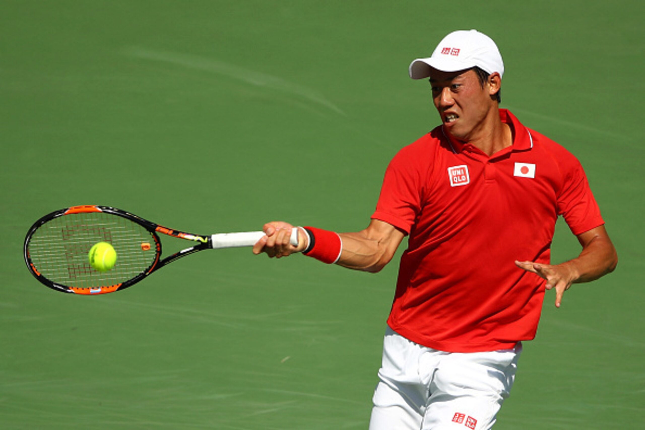 RIO DE JANEIRO, BRAZIL - AUGUST 13:  Kei Nishikori of Japan returns a shot against Andy Murray of Great Britain during the Men's Singles Semifinal Match on Day 8 of the Rio 2016 Olympic Games at the Olympic Tennis Centre on August 13, 2016 in Rio de Janei