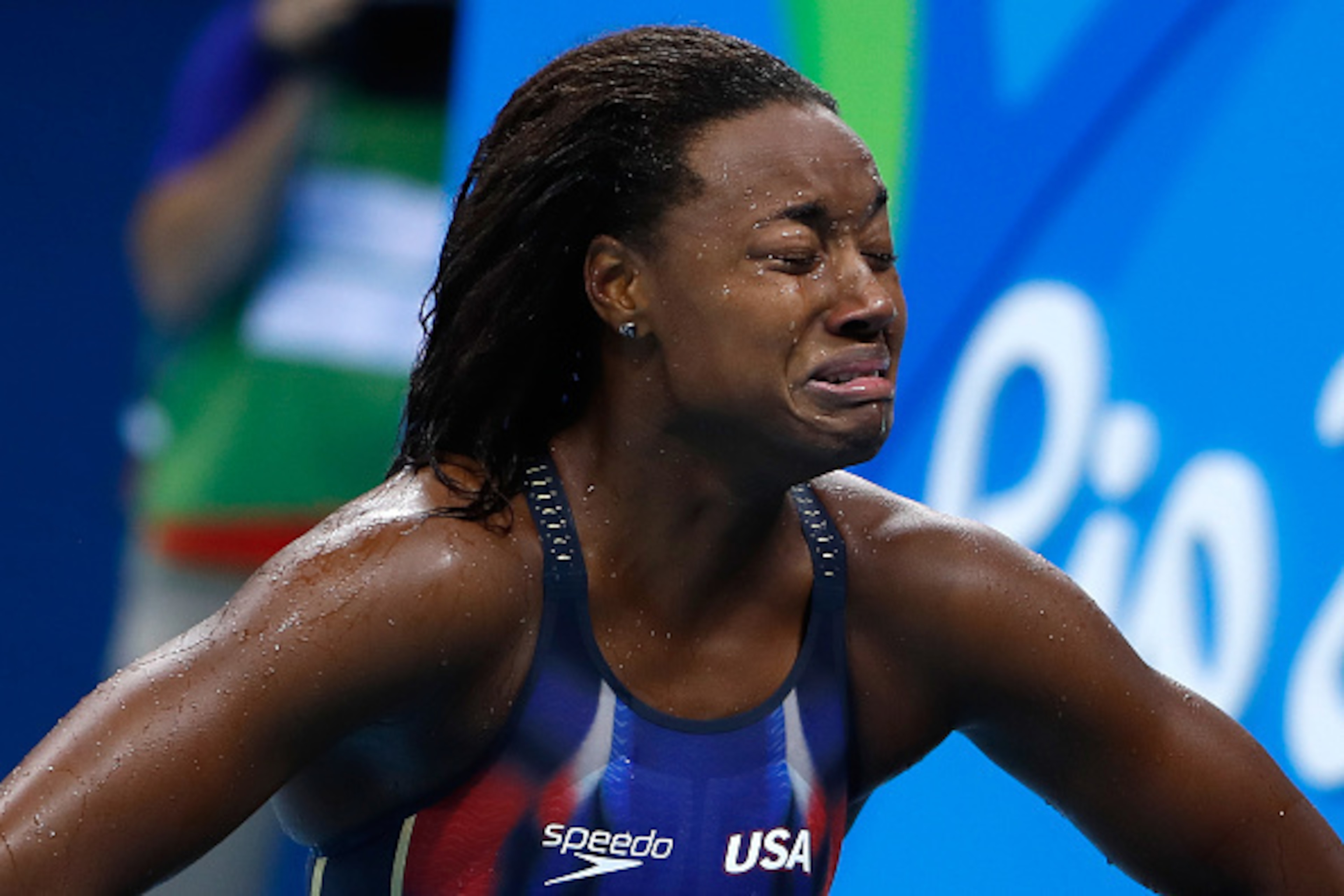 RIO DE JANEIRO, BRAZIL - AUGUST 11: Simone Manuel of the United States celebrates after winning gold in the Women's 100m Freestyle Final on Day 6 of the Rio 2016 Olympic Games at the Olympic Aquatics Stadium on August 11, 2016 in Rio de Janeiro, Brazil. RIO DE JANEIRO, BRAZIL - AUGUST 11: Simone Manuel of the United States celebrates after winning gold in the Women's 100m Freestyle Final on Day 6 of the Rio 2016 Olympic Games at the Olympic Aquatics Stadium on August 11, 2016 in Rio de Janeiro, Brazil.